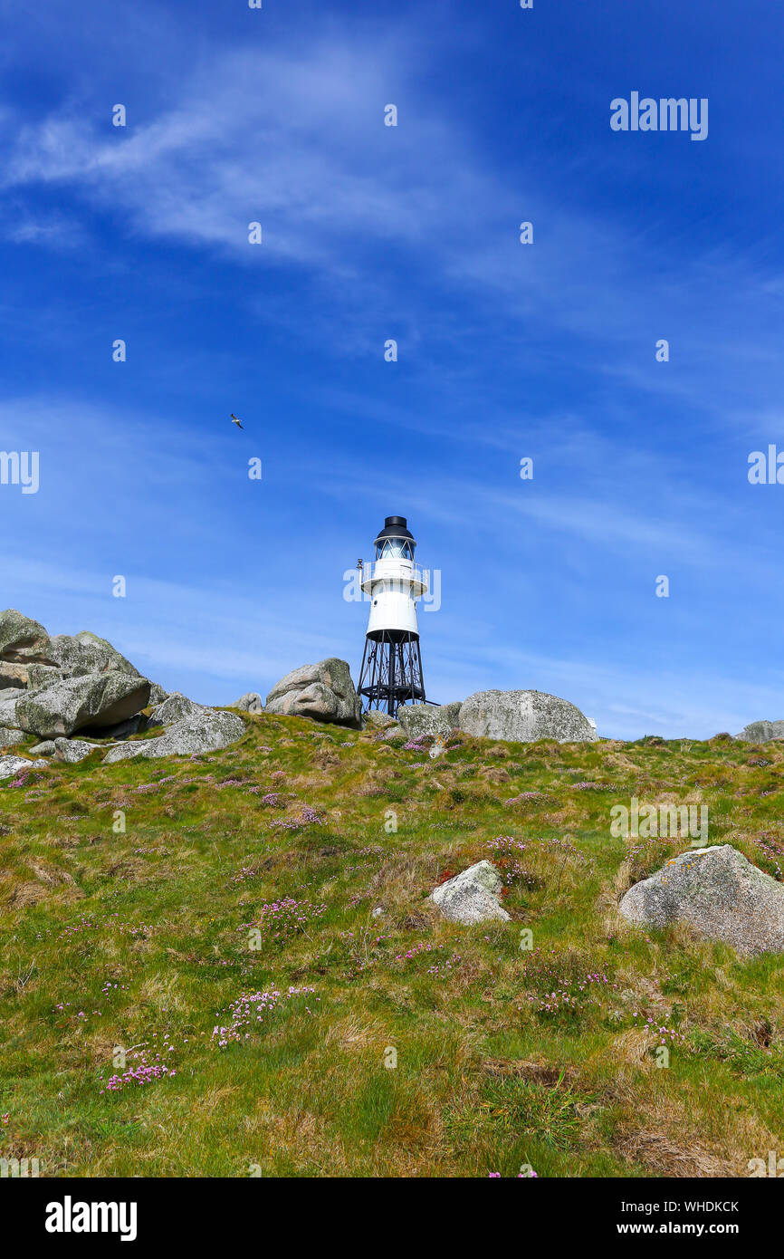 Peninnis Lighthouse, on Peninnis Head, was built by Trinity House in 1911 on St. Mary’s Island in the Isles of Scilly, Cornwall, England, UK Stock Photo