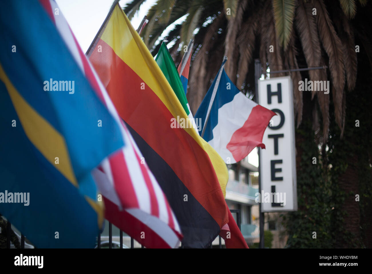 Various Flags By Hotel Sign Stock Photo Alamy