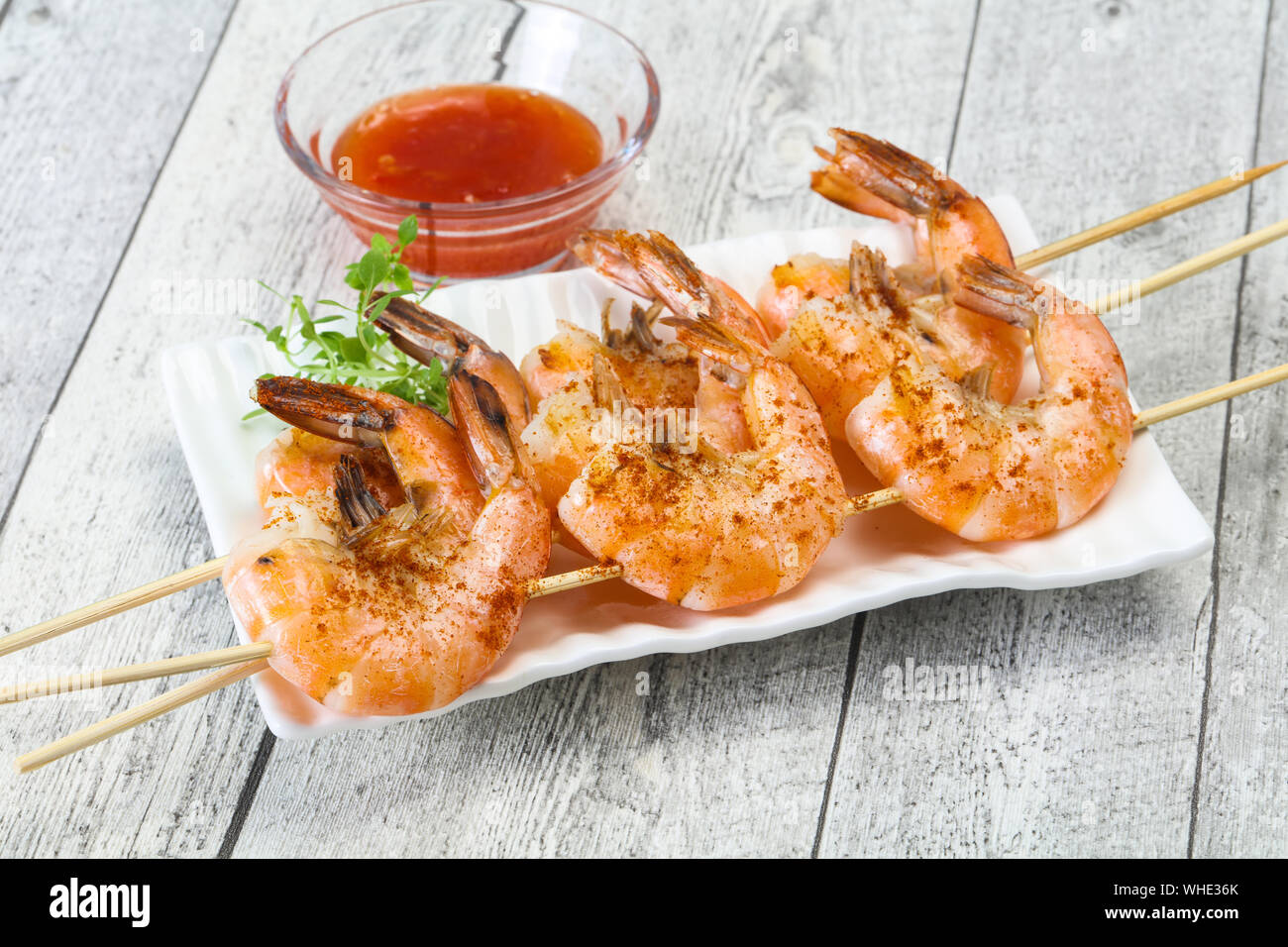 Grilled prawn skewer with spicy sauce Stock Photo Alamy