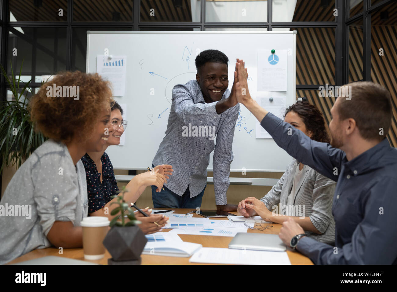 Happy diverse male businessmen hi-res stock photography and images - Alamy