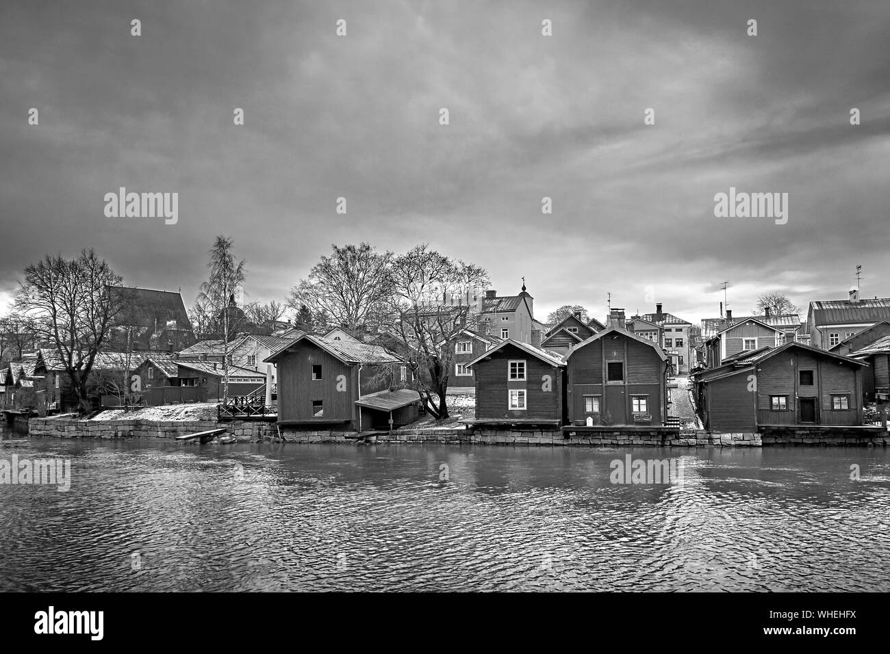 Old historic Porvoo, Finland with wooden houses and medieval stone and brick Porvoo Cathedral at blue hour sunrise. Stock Photo