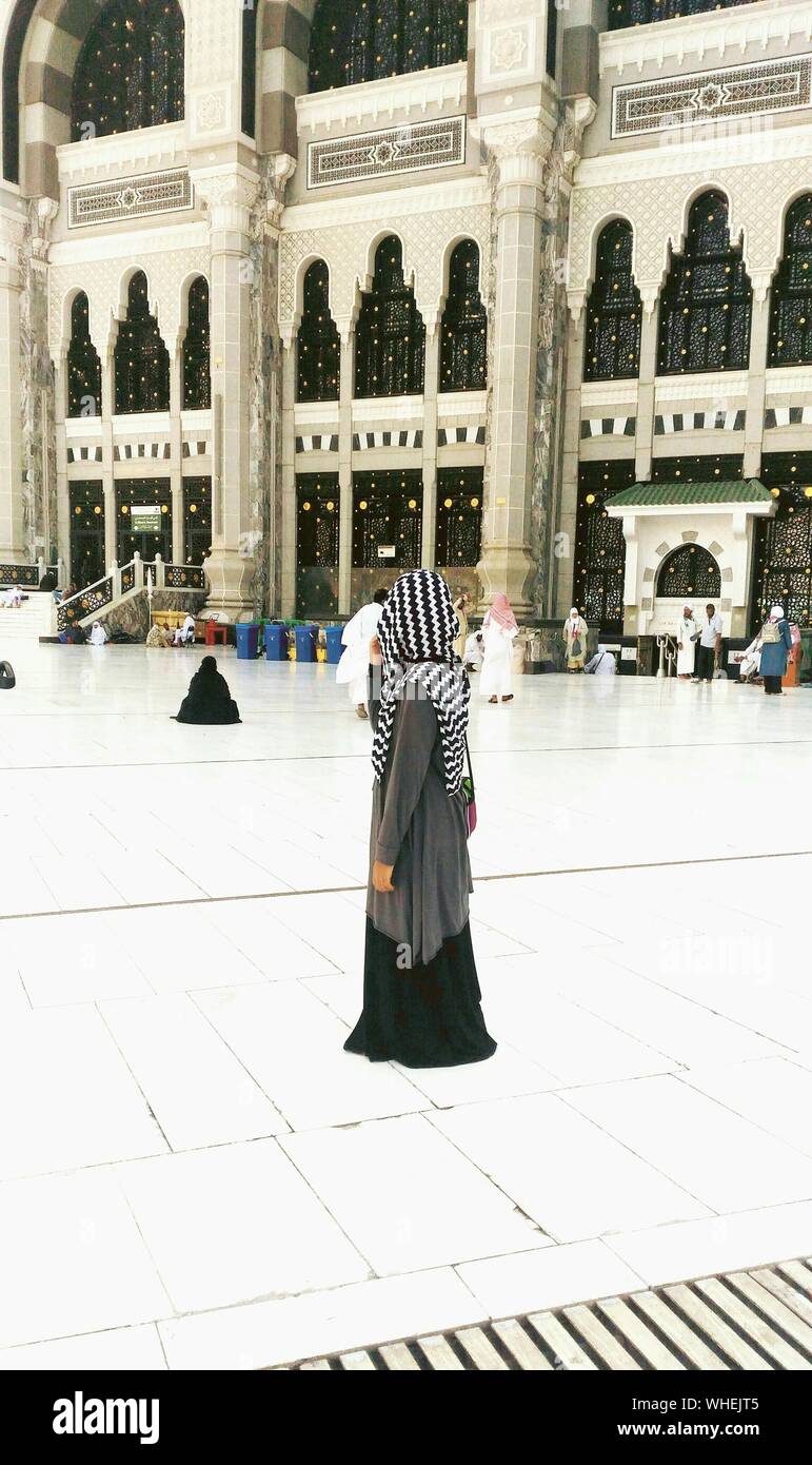 Full Length Of Woman Standing At Al-haram Mosque Stock Photo - Alamy