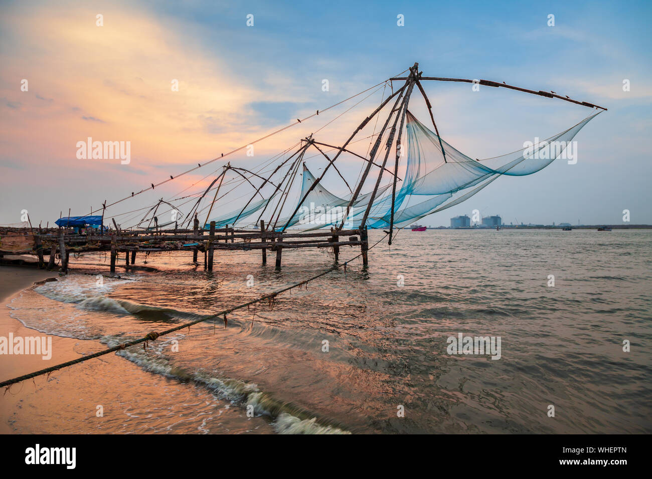 Chinese fishing nets or cheena vala are a type of stationary lift net, located in Fort Kochi in Cochin, India Stock Photo