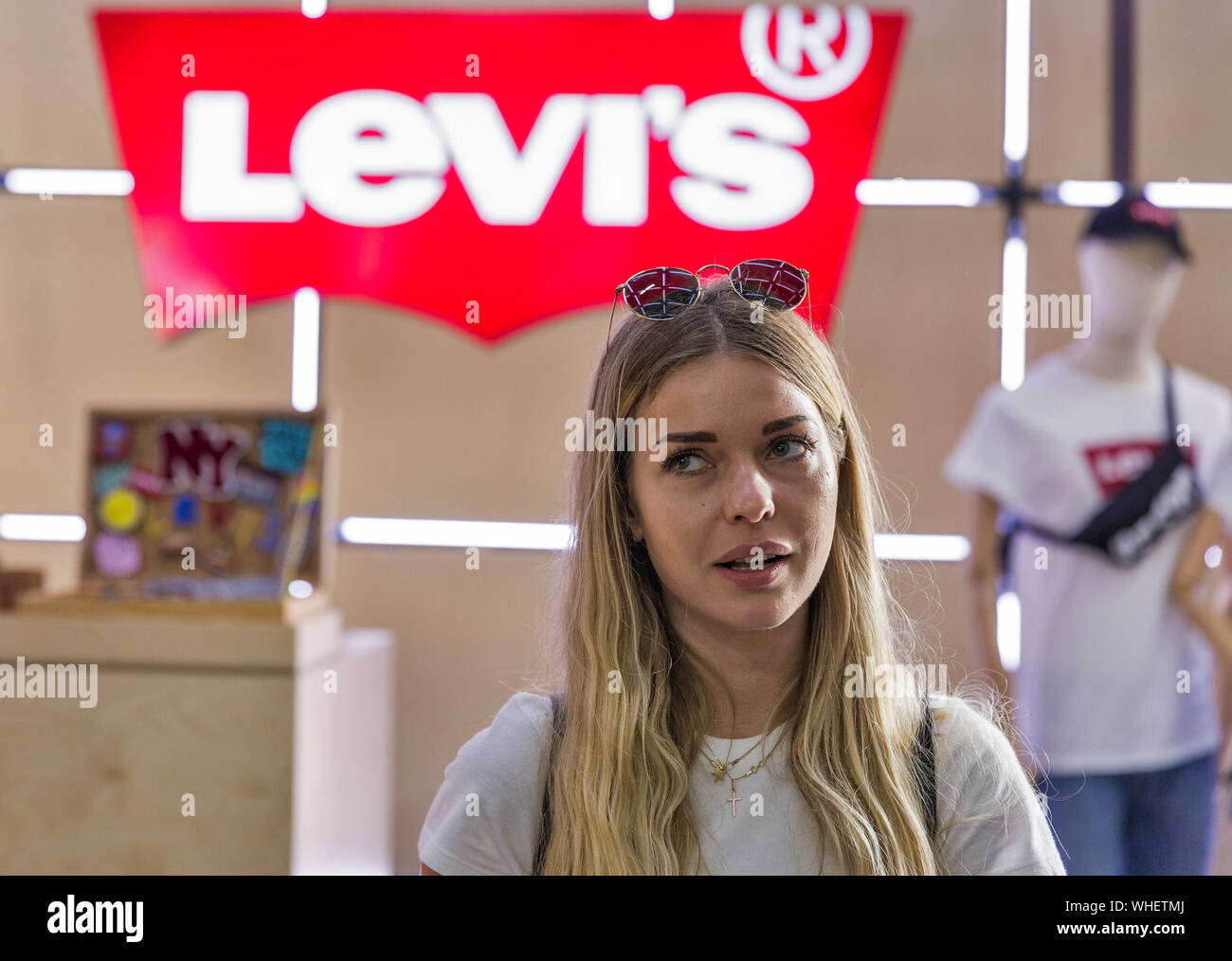 KYIV, UKRAINE - MAY 18, 2019: Young beautiful woman works at Levi's or Levi  Strauss an American clothing company booth during Kyiv Beer Festival vol  Stock Photo - Alamy