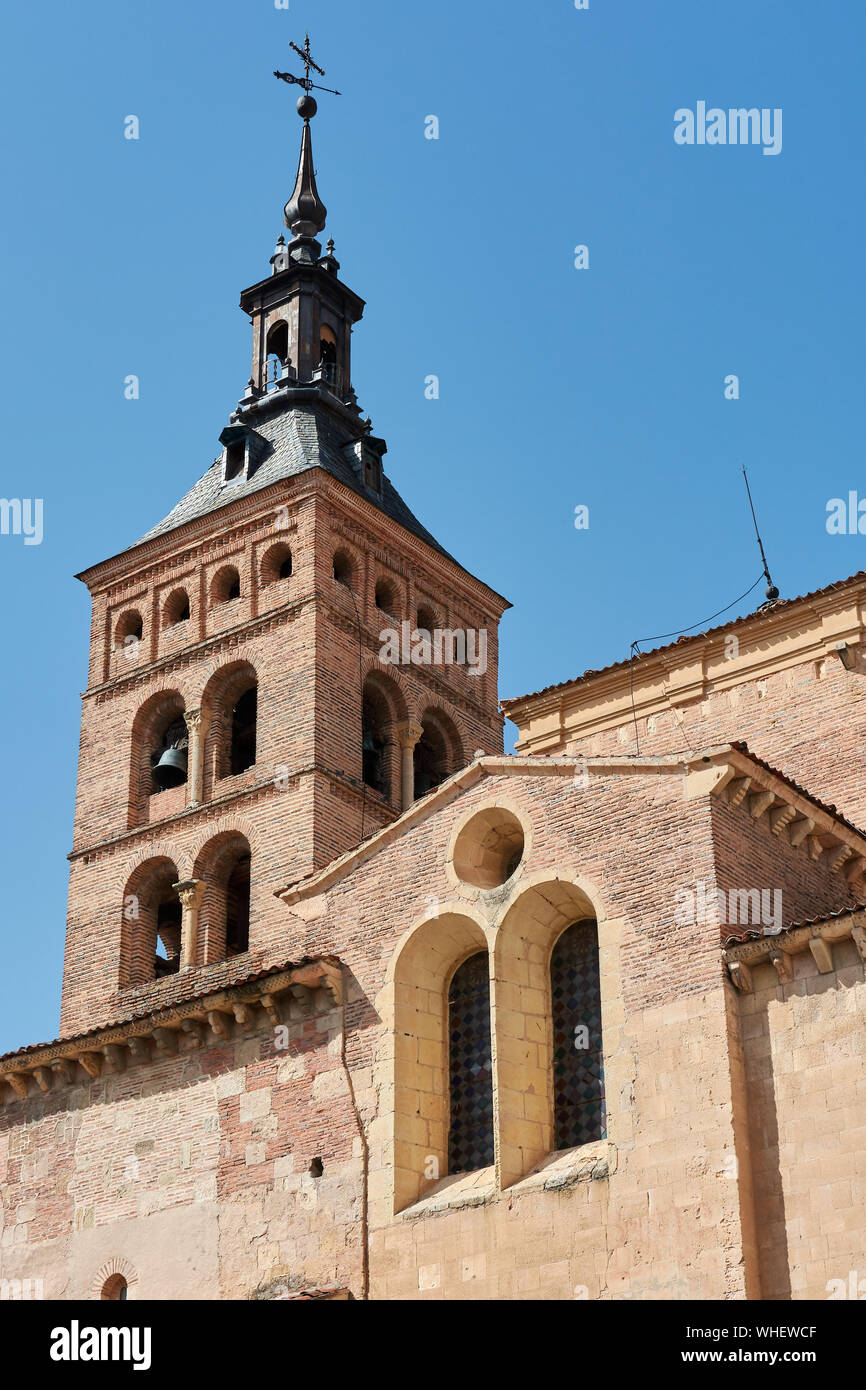 SEGOVIA, SPAIN - APRIL 25, 2018: Details and bell tower of the facade of the San Martin church in Segovia. Stock Photo
