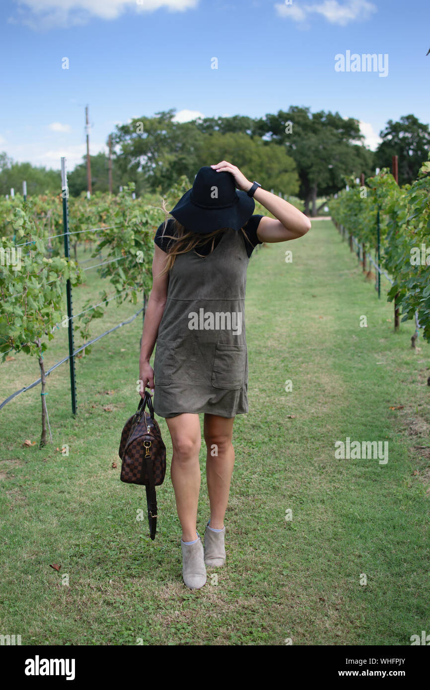 Pretty female model walking rocks hi-res stock photography and images ...