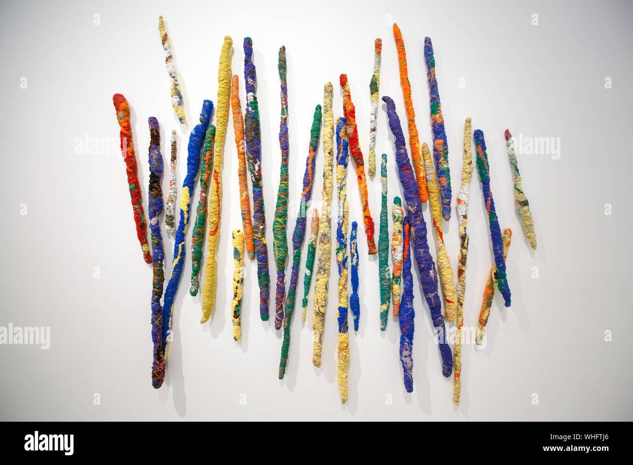 Sheila Hicks - Pigment Sticks 2014- 15 - Bamboo sticks with pigmented synthetic fibres for bas-relief   - 260 x 250 x 10 cm Stock Photo