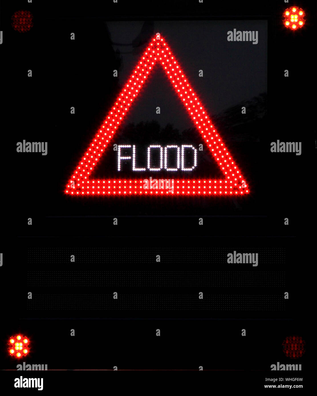 Flood Warning, coastal flooding, danger sign, illuminated, street sign, high tide, tides, alert, Hunstanton, Norfolk, England, UK Stock Photo