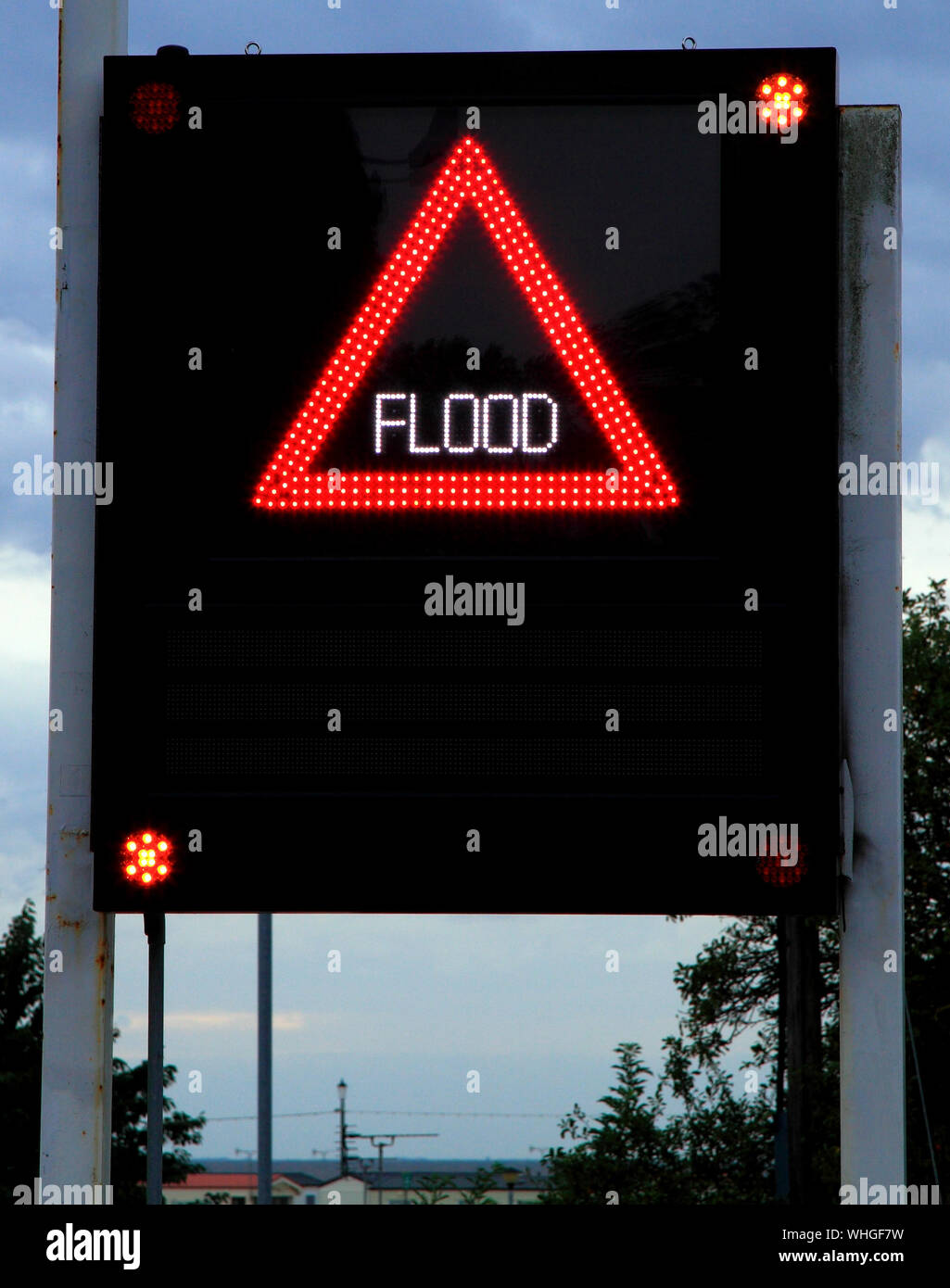 Flood Warning, coastal flooding, danger sign, illuminated, street sign, high tide, tides, alert, Hunstanton, Norfolk, England, UK Stock Photo