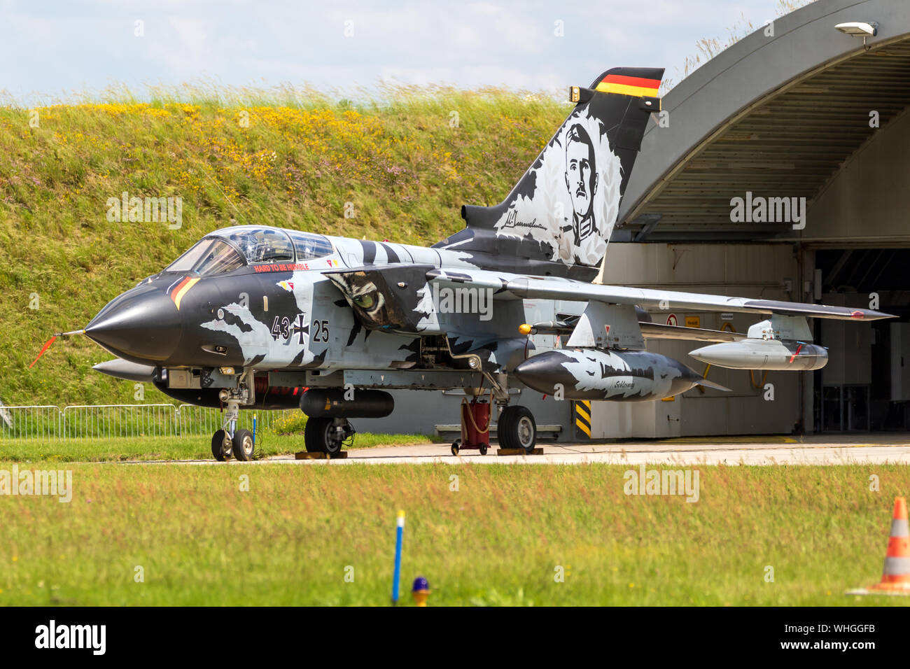 JAGEL, GERMANY - JUN 13, 2019: Special livery painted German Air Force Panavia Tornado fighter bomber jet plane from TLG-51 squadron in front of a har Stock Photo