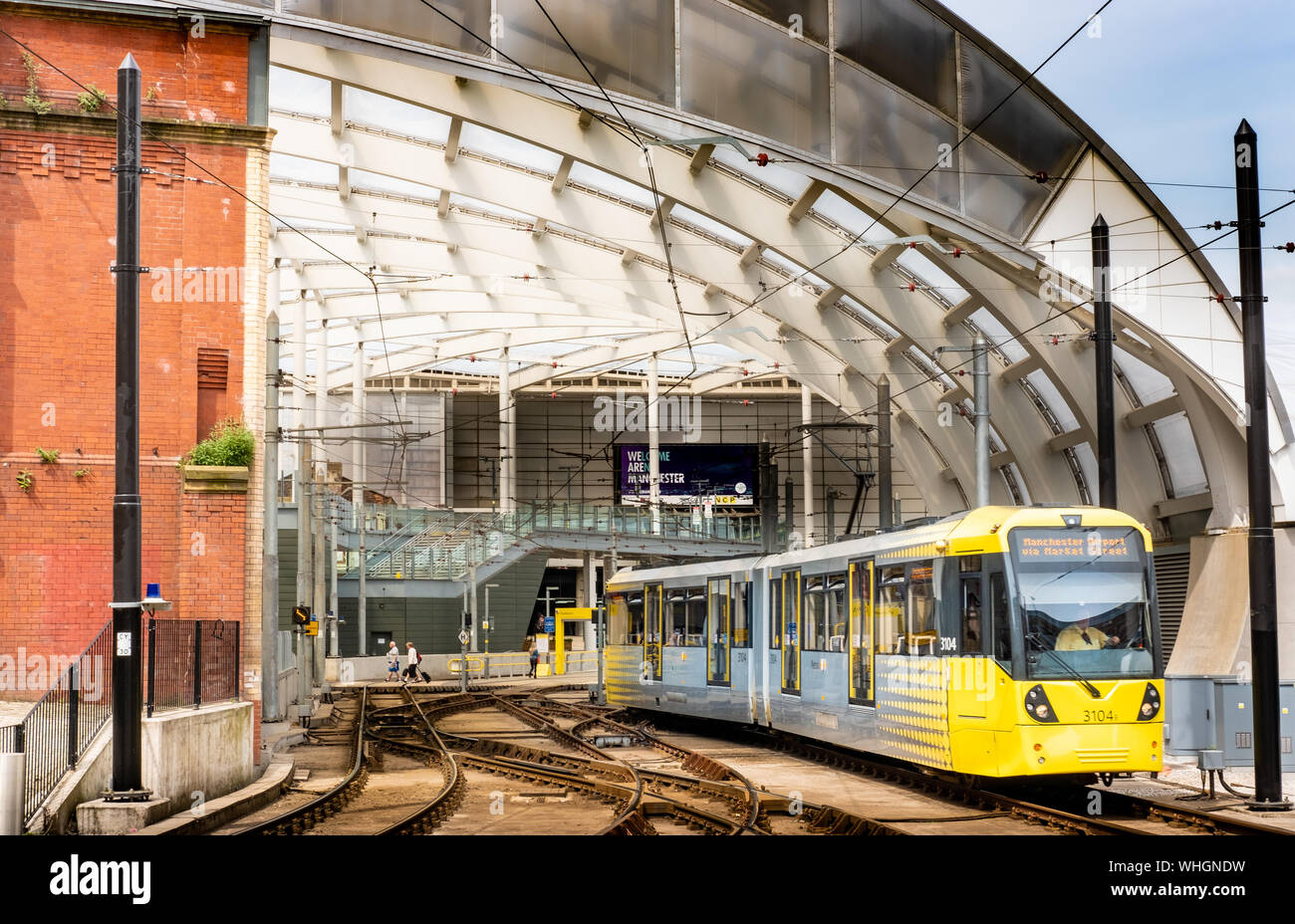 Tram leaves Manchester Victoria Station Stock Photo