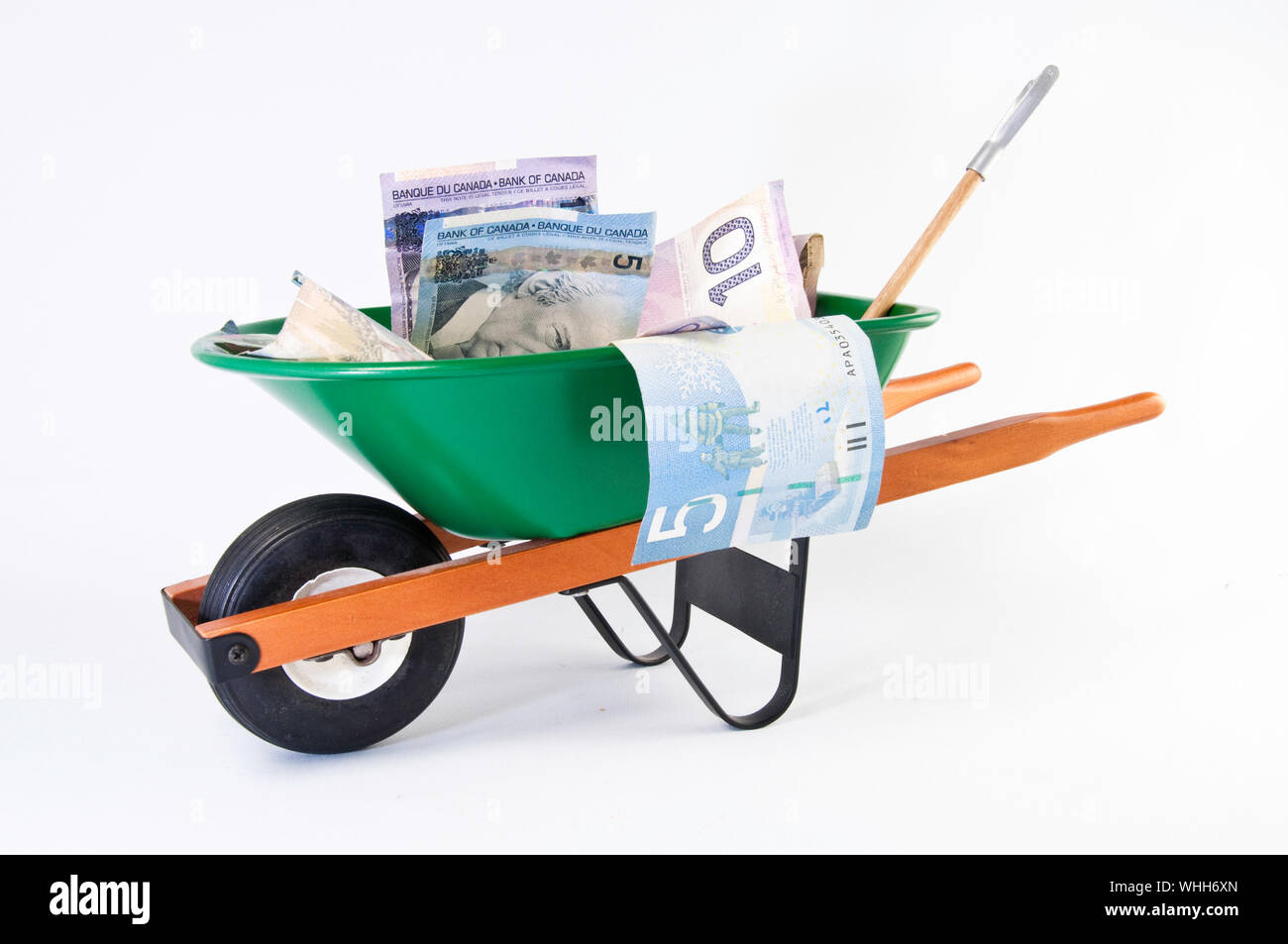 Wheelbarrow money hires stock photography and images Alamy