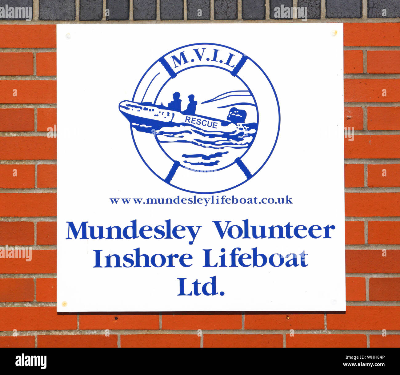 A logo and sign on the Volunteer Inshore Lifeboat house on the North Norfolk coast at Mundesley, Norfolk, England, United Kingdom, Europe. Stock Photo