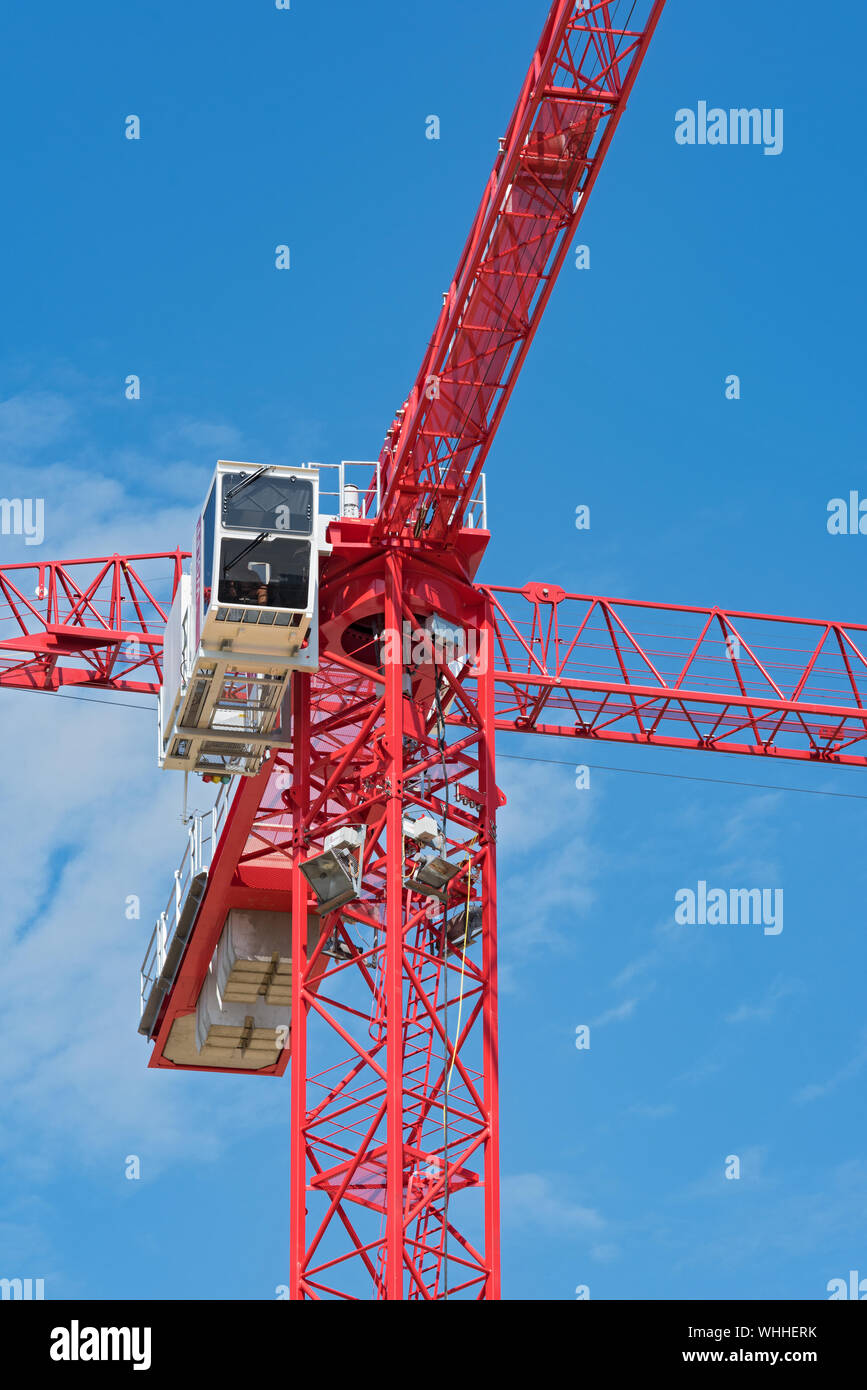 close up of the cabin of a red construction crane Stock Photo