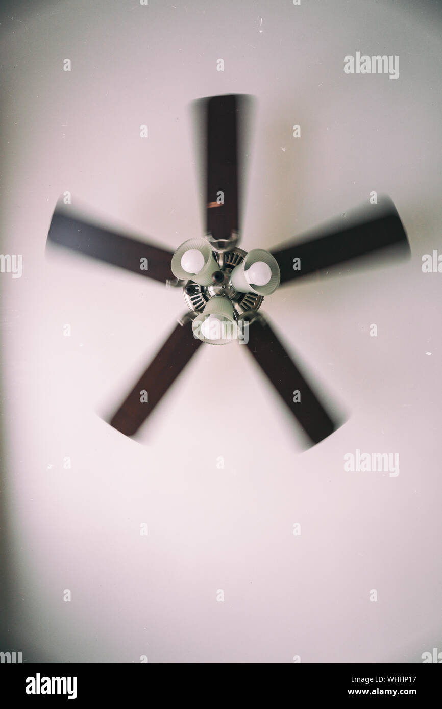 A Vintage Photo Of An Old Electric Ceiling Fan Installed Into A