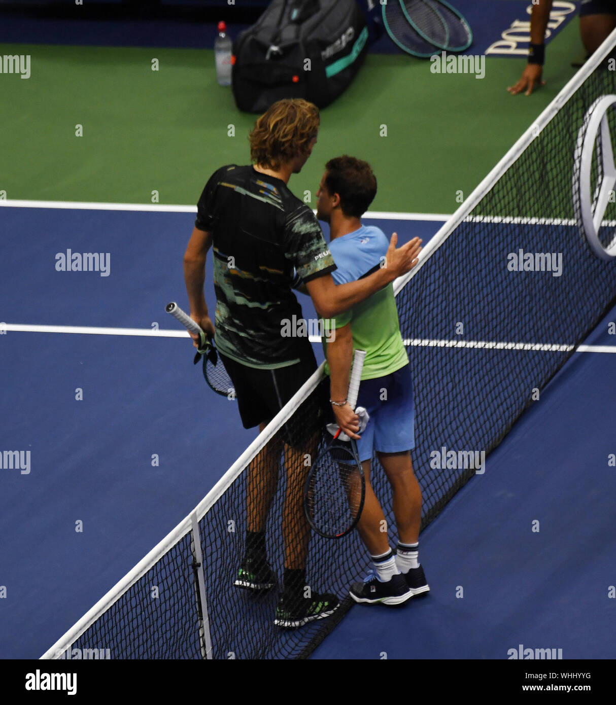 Flushing Meadows New York US Open Tennis Day 5 01/09/2019 Diego Schwartzman  (ARG) with his defeated opponent Alexander Zverev at the net after he wins  fourth round match Photo Roger Parker International