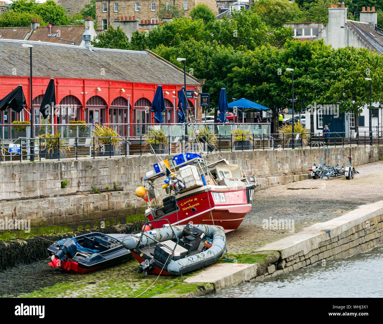 Fishing boat on slipway, Newhaven harbour, Edinbugh, Scotland, UK Stock Photo