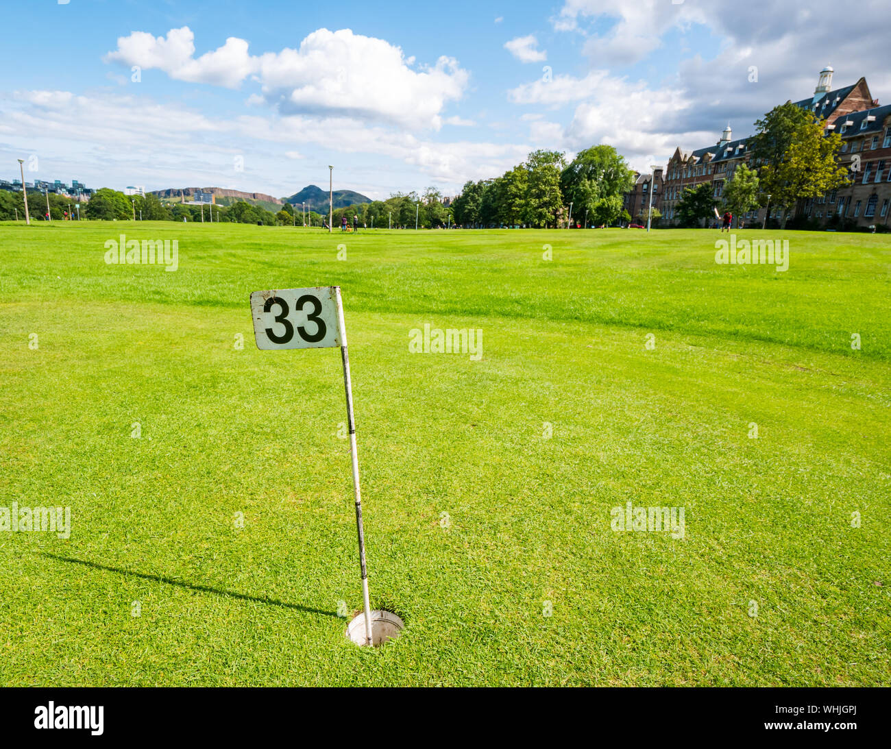 Putting green golf hole with number 33, The Meadows, Edinburgh, Scotland, UK Stock Photo