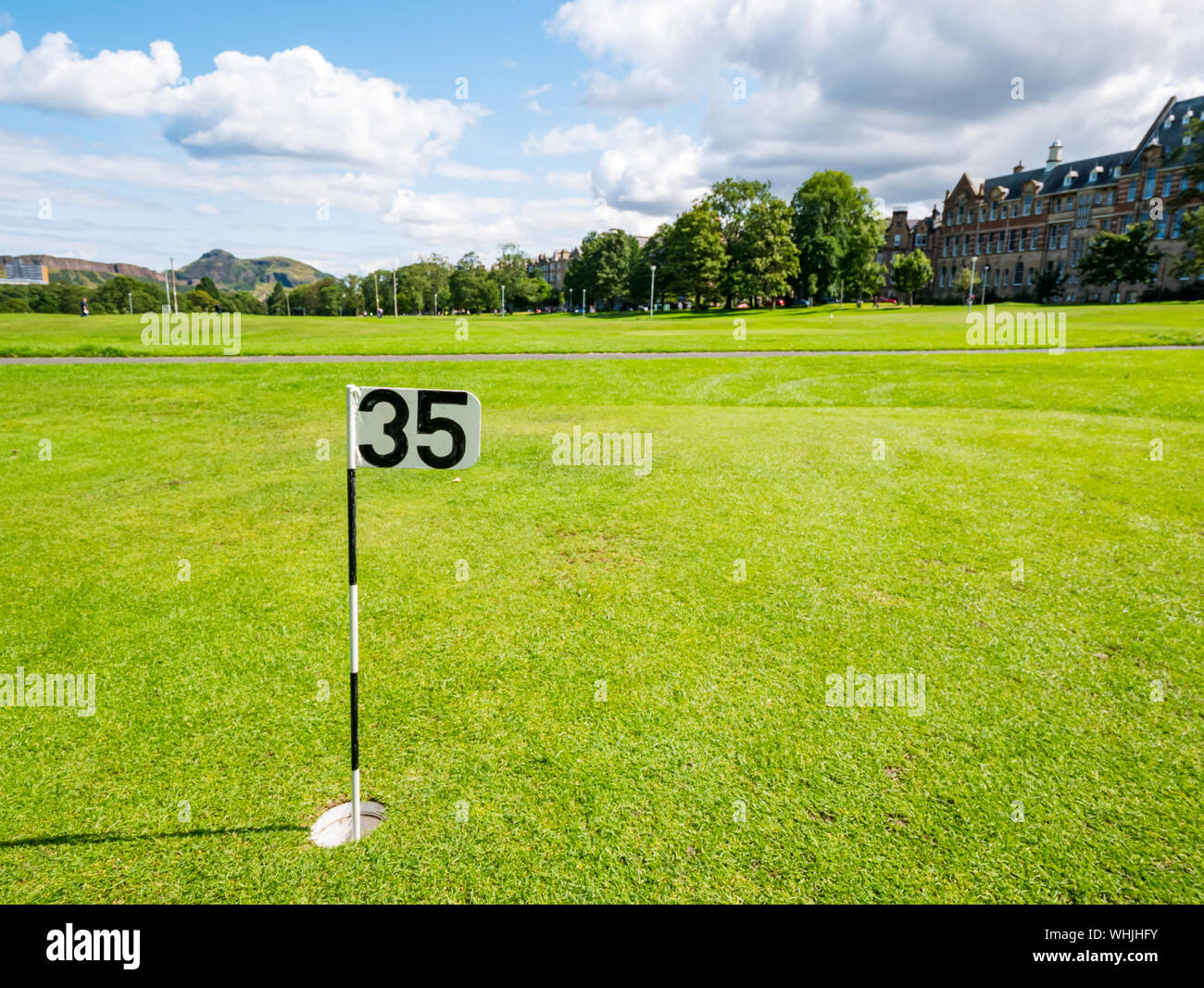Putting green golf hole with number 35, The Meadows, Edinburgh, Scotland, UK Stock Photo