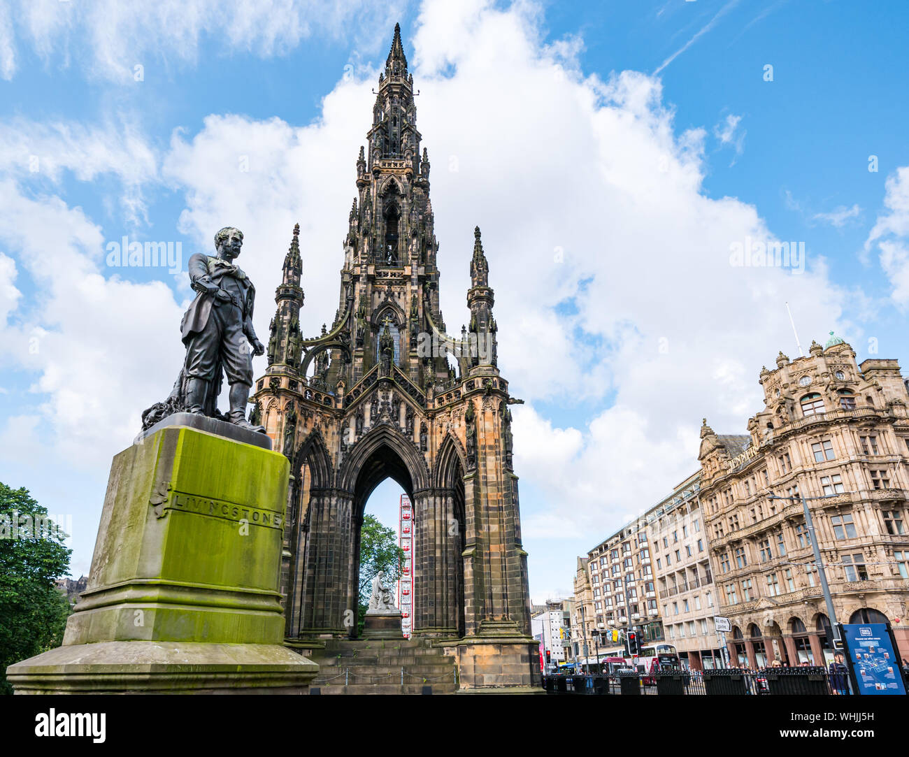 Victorian Gothic Scott monument & David Livingstone statue, Princes Street during festival with M&D Big Whee & Jenner’s store Edinburgh, Scotland, UK Stock Photo