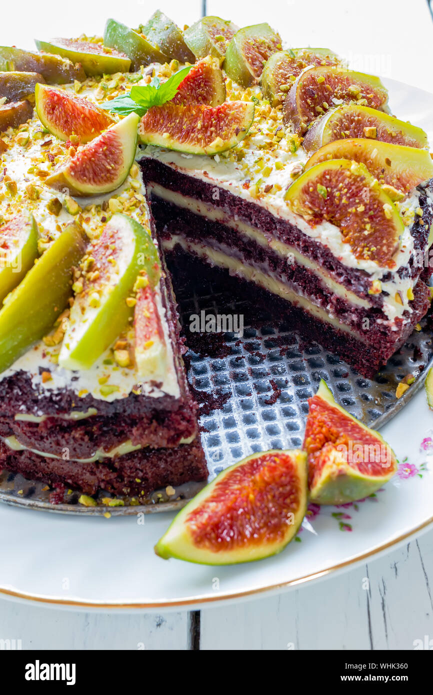 Close-up Of Cake And Fruit In Plate Stock Photo