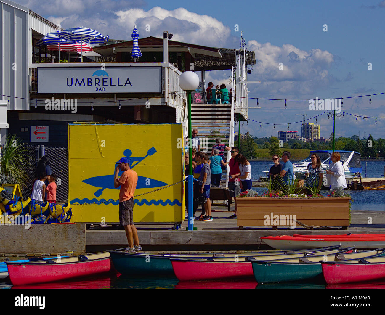 People queuing at the boat rental kiosk, Dow's Lake Pavilion, Ottawa