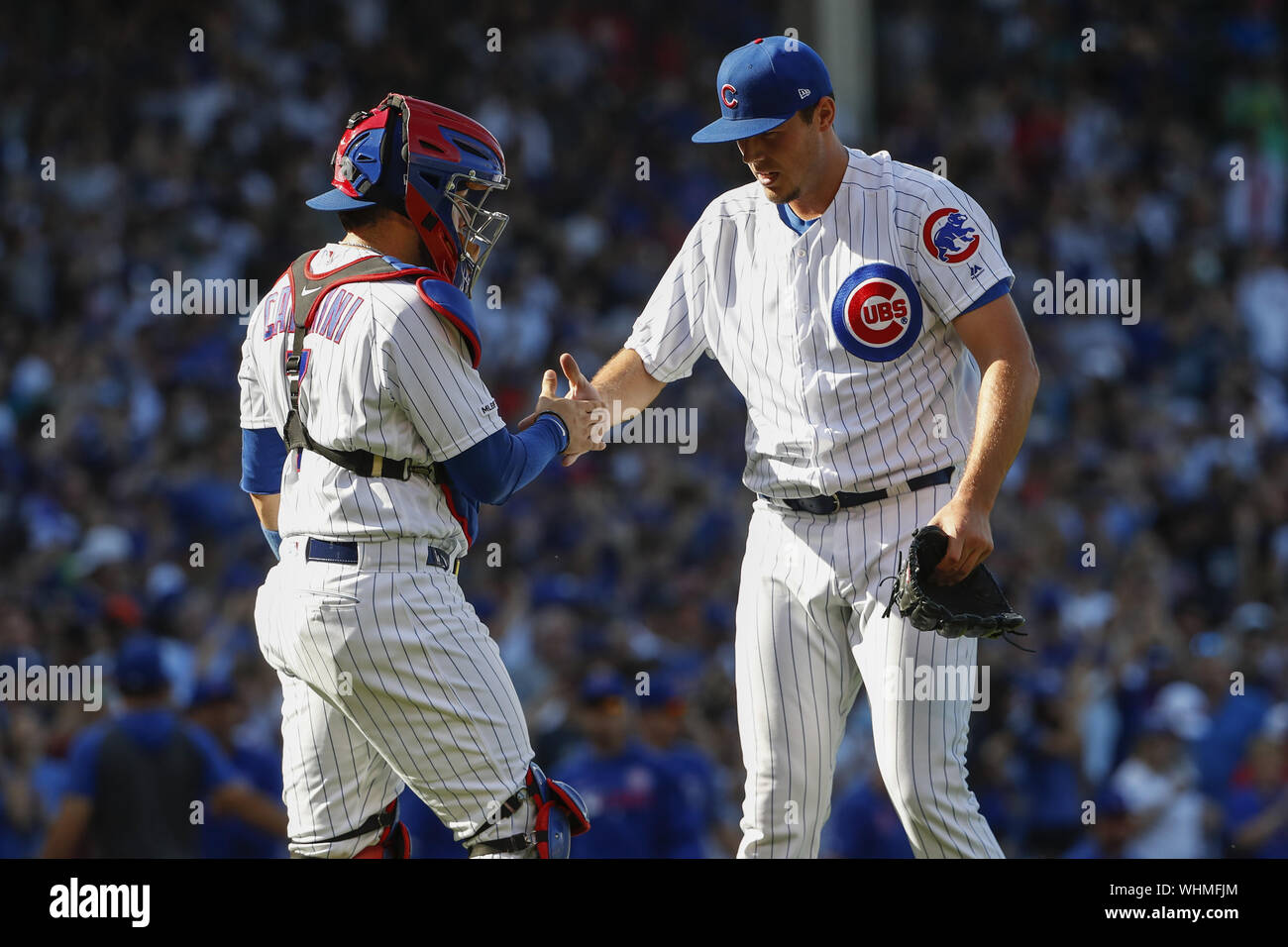 Chicago, United States. 02nd Sep, 2019. Chicago Cubs relief pitcher Brad Wieck (R) celebrates with catcher Victor Caratini (L) after defeating the Seattle Mariners in a baseball game at Wrigley Field on Monday, September 2, 2019 in Chicago. Photo by Kamil Krzaczynski/UPI Credit: UPI/Alamy Live News Stock Photo