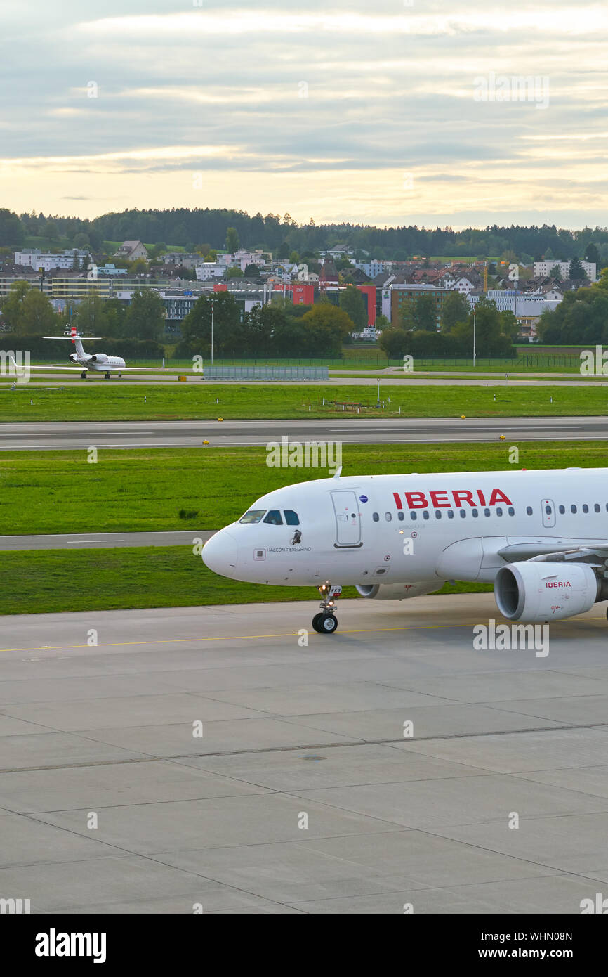 ZURICH, SWITZERLAND - CIRCA OCTOBER, 2018:  an Iberia aircraft taxing at Zurich International Airport. Stock Photo