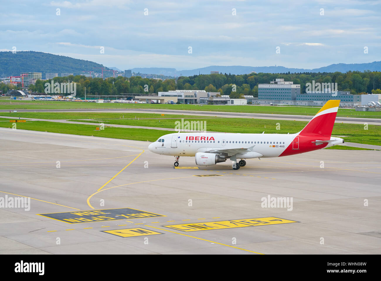 ZURICH, SWITZERLAND - CIRCA OCTOBER, 2018: an Iberia aircraft taxing at Zurich International Airport. Stock Photo