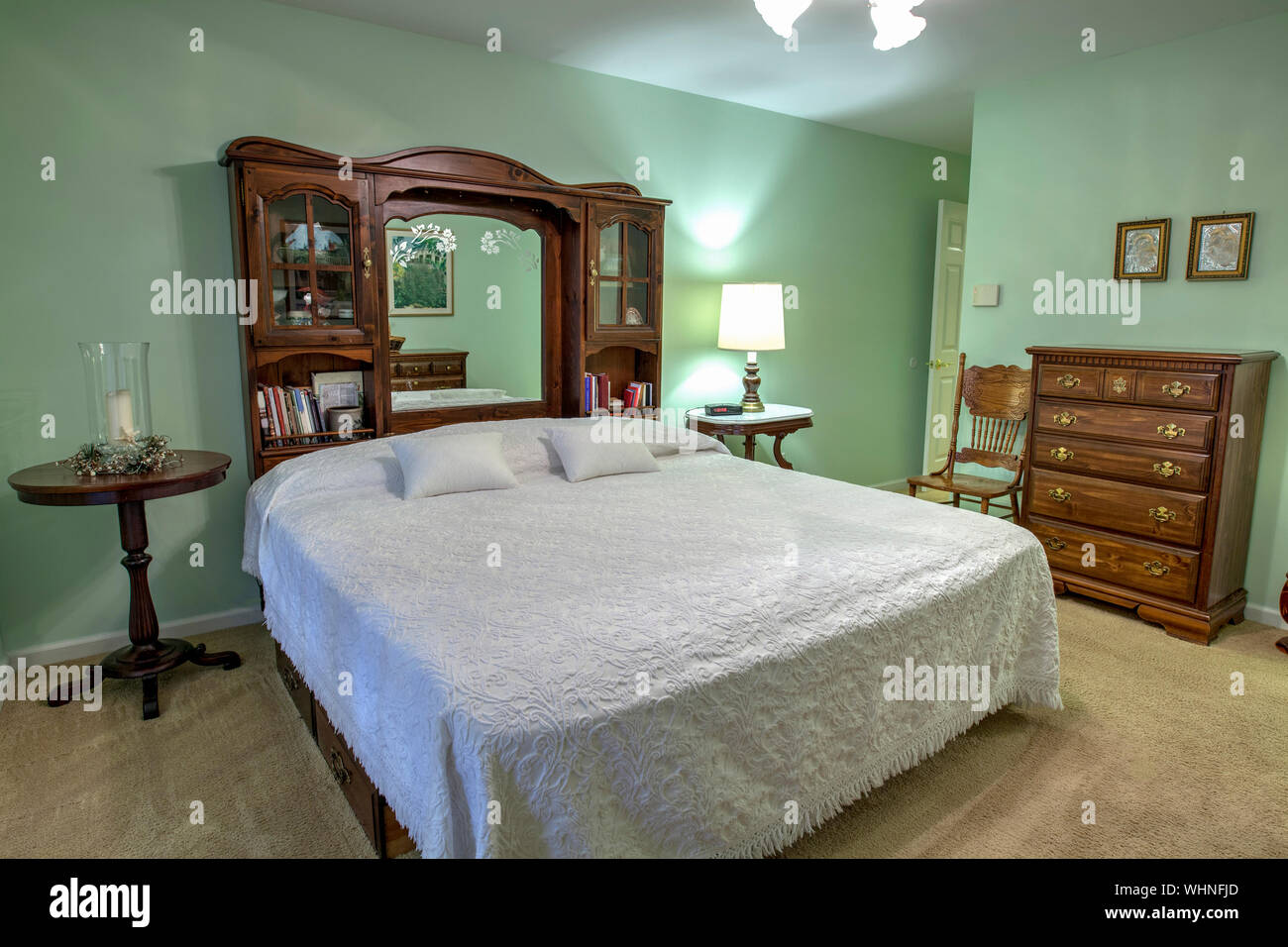 simple bedroom with queen bed Stock Photo Alamy