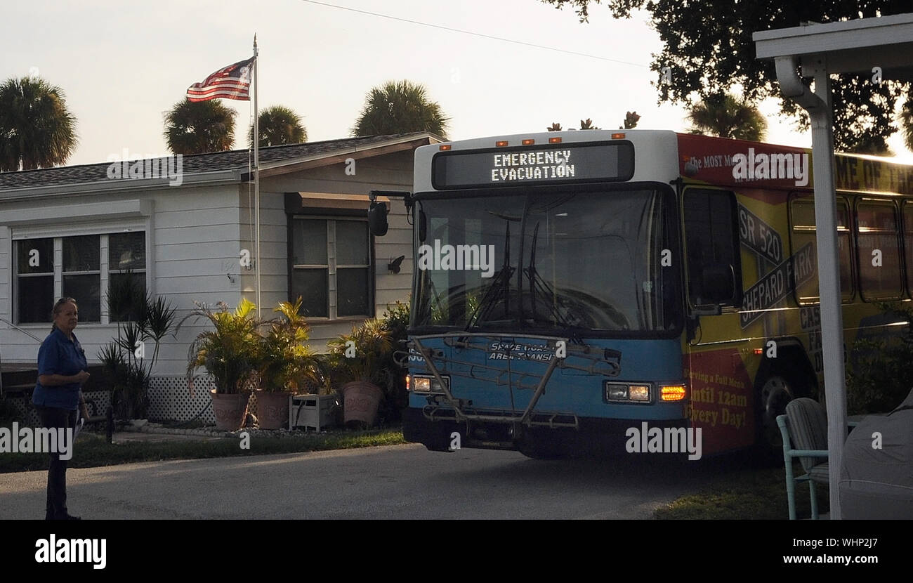 Cape Canaveral, United States. 02nd Sep, 2019. September 2, 2019 - Cape Canaveral, Florida, United States - An emergency evacuation bus waits to pick up residents from the Cocoa Palms Mobile Home Park for transport to shelters as Hurricane Dorian is forecast to move dangerously close to the coast to Florida after striking the Bahamas as a Category 5 storm, on September 2, 2019 in Cape Canaveral, Florida. Credit: Paul Hennessy/Alamy Live News Stock Photo