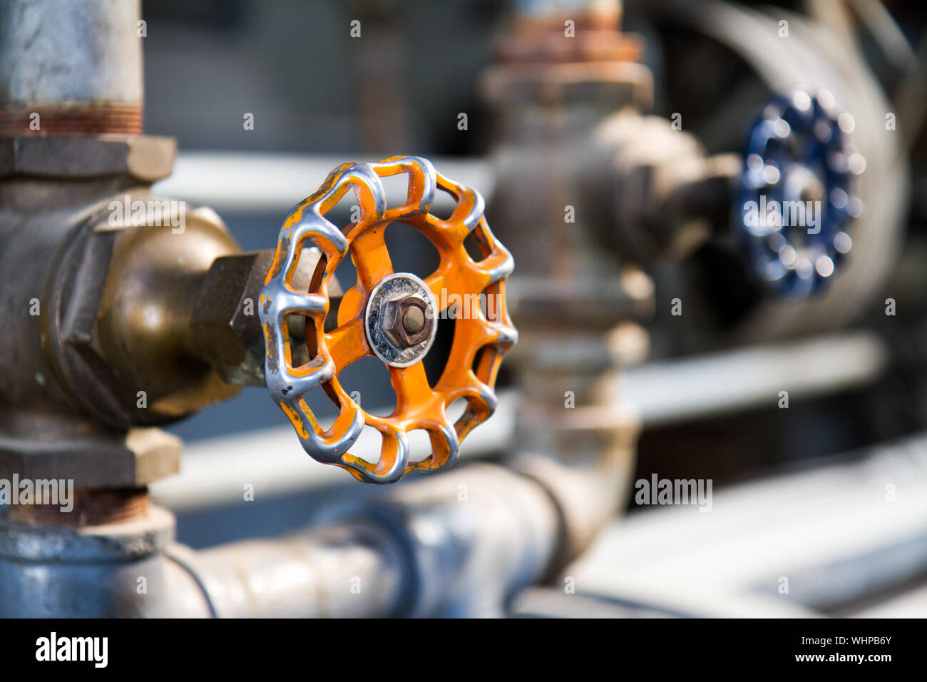 Water pipes and their valves to open Stock Photo Alamy