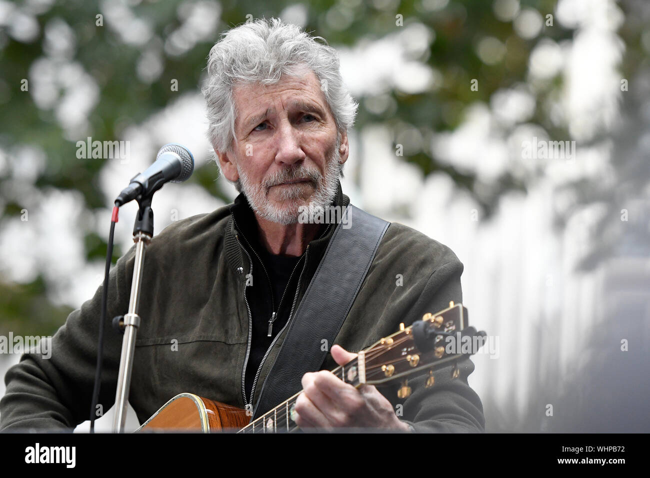 London, UK. 02nd Sep, 2019. Roger Waters performs during the Don't Extradite Assange rally in London.Julian Assange supporters rally outside the British Home Secretary office building to demand the freedom of Assange and the no extradition to the US, during the rally, Roger Waters performed his Pink Floyd song Wish You Were Here, the journalist and documentary filmmaker John Pilger and Gabriel Assange gave a speech in solidarity with Julian Assange. Credit: SOPA Images Limited/Alamy Live News Stock Photo