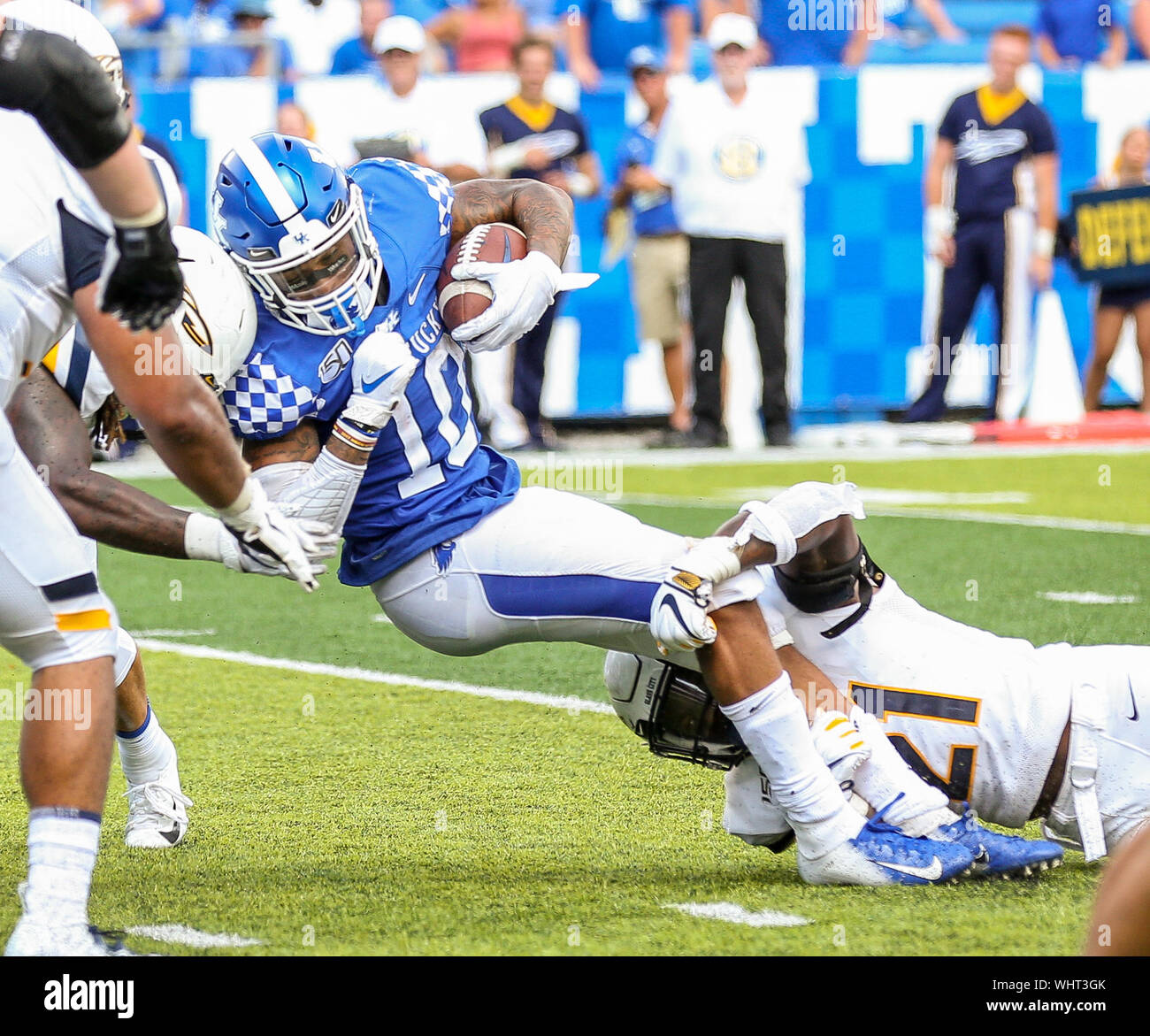 August 31, 2019: Kentucky's A.J. Rose Jr. #10 pushes forward for extra yardage during the NCAA football game between the Kentucky Wildcats and the Toledo Rockets at Kroger Field in Lexington, KY. Kyle Okita/CSM Stock Photo