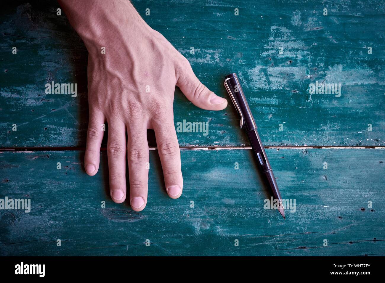 Old men holding hands hi-res stock photography and images - Alamy