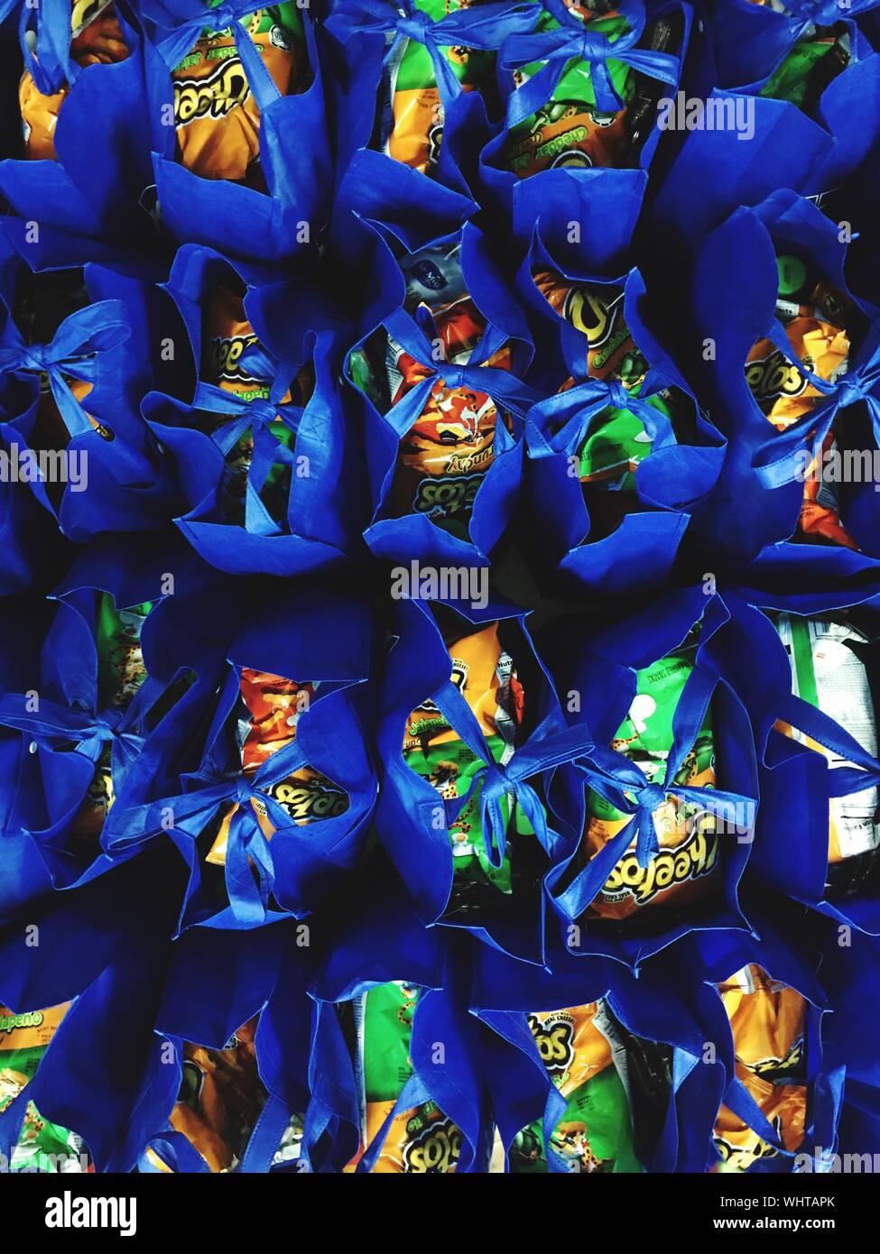 Full Frame Shot Of Snacks In Blue Bag Stock Photo