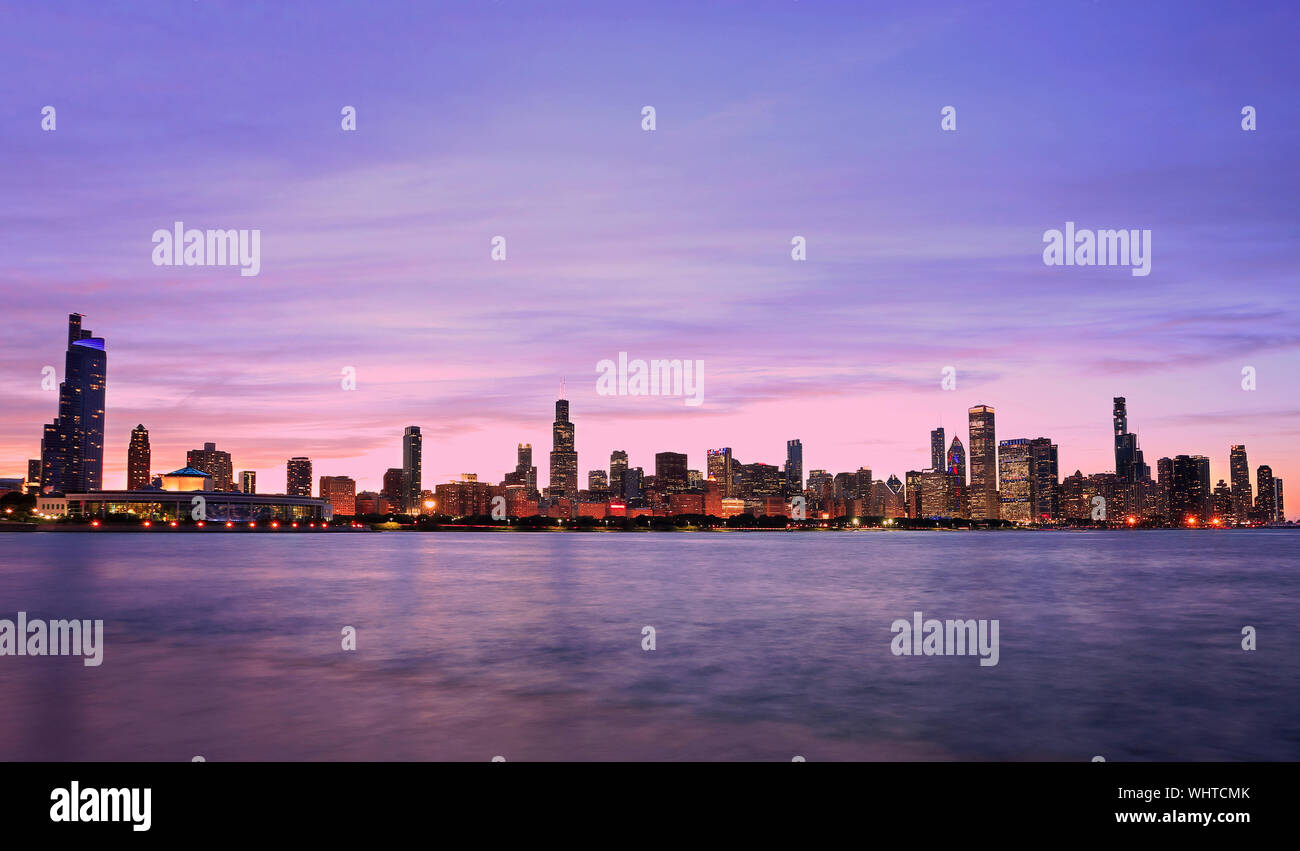 Panoramic view of Chicago skyline at dusk with Lake Michigan on the foreground, IL, USA Stock Photo