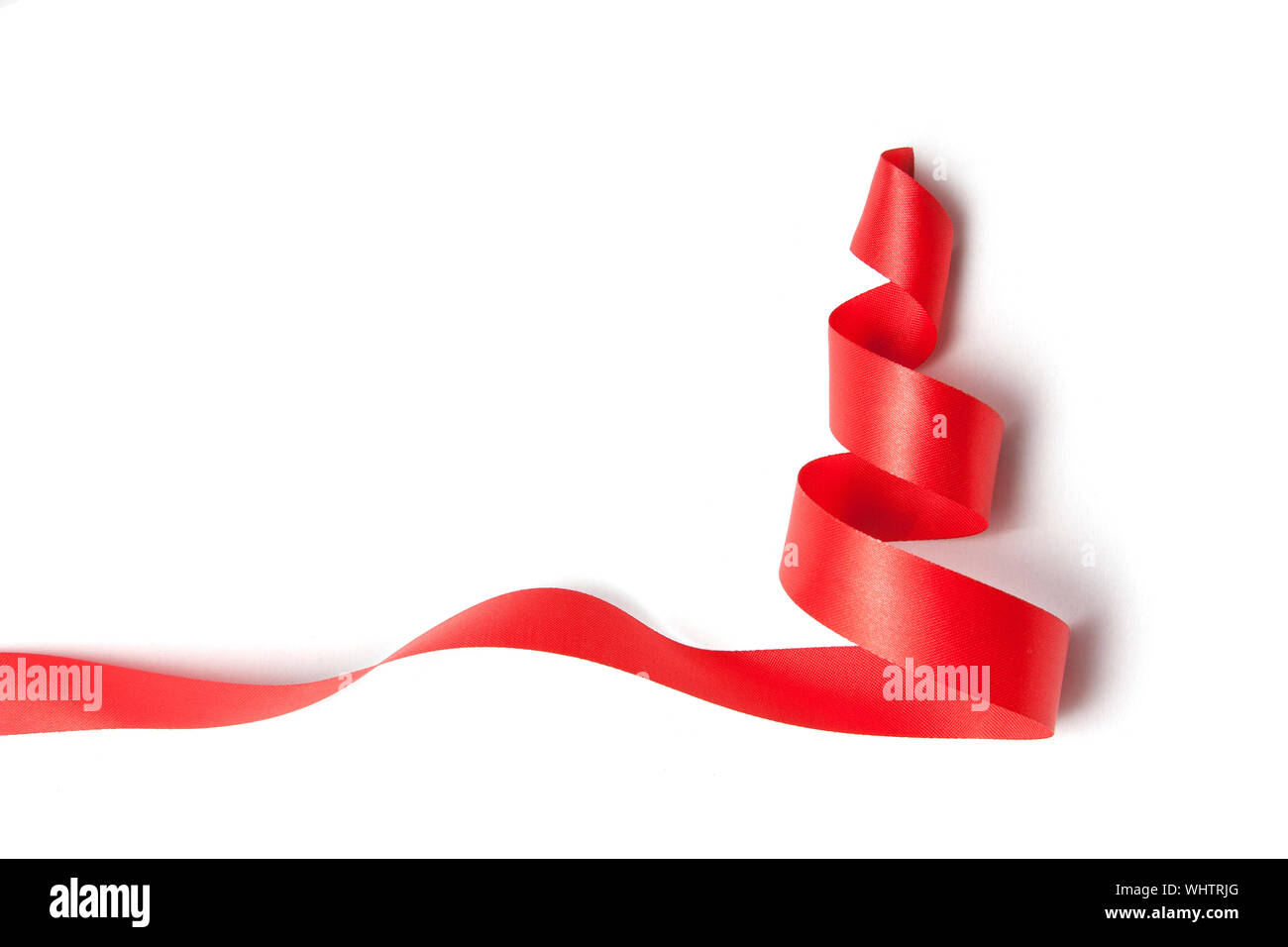 Christmas tree ribbon on a white background Stock Photo - Alamy