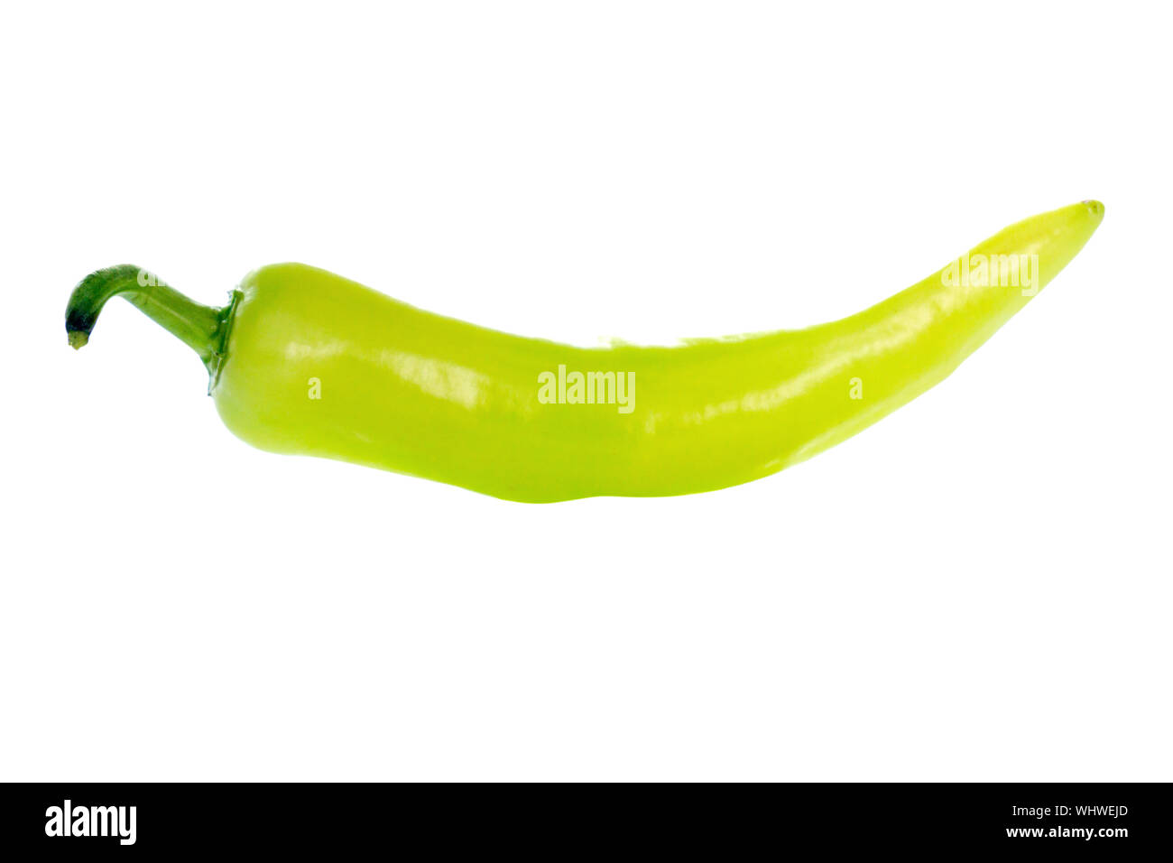 Close-up Of Green Jalapeno Pepper Over White Background Stock Photo