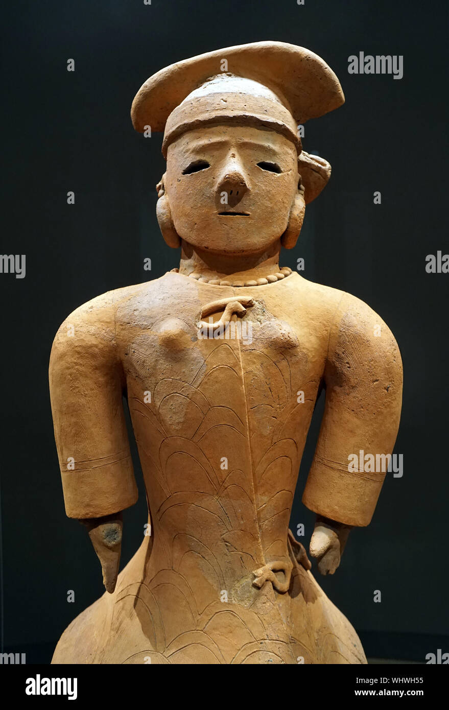 Haniwa (terracotta tomb figurine) woman in formal attire, Kofun period, 3rd-7th century Stock Photo