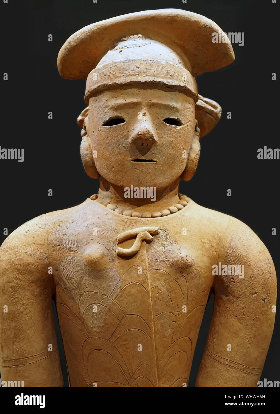 Haniwa (terracotta tomb figurine) woman in formal attire, Kofun period, 3rd-7th century Stock Photo
