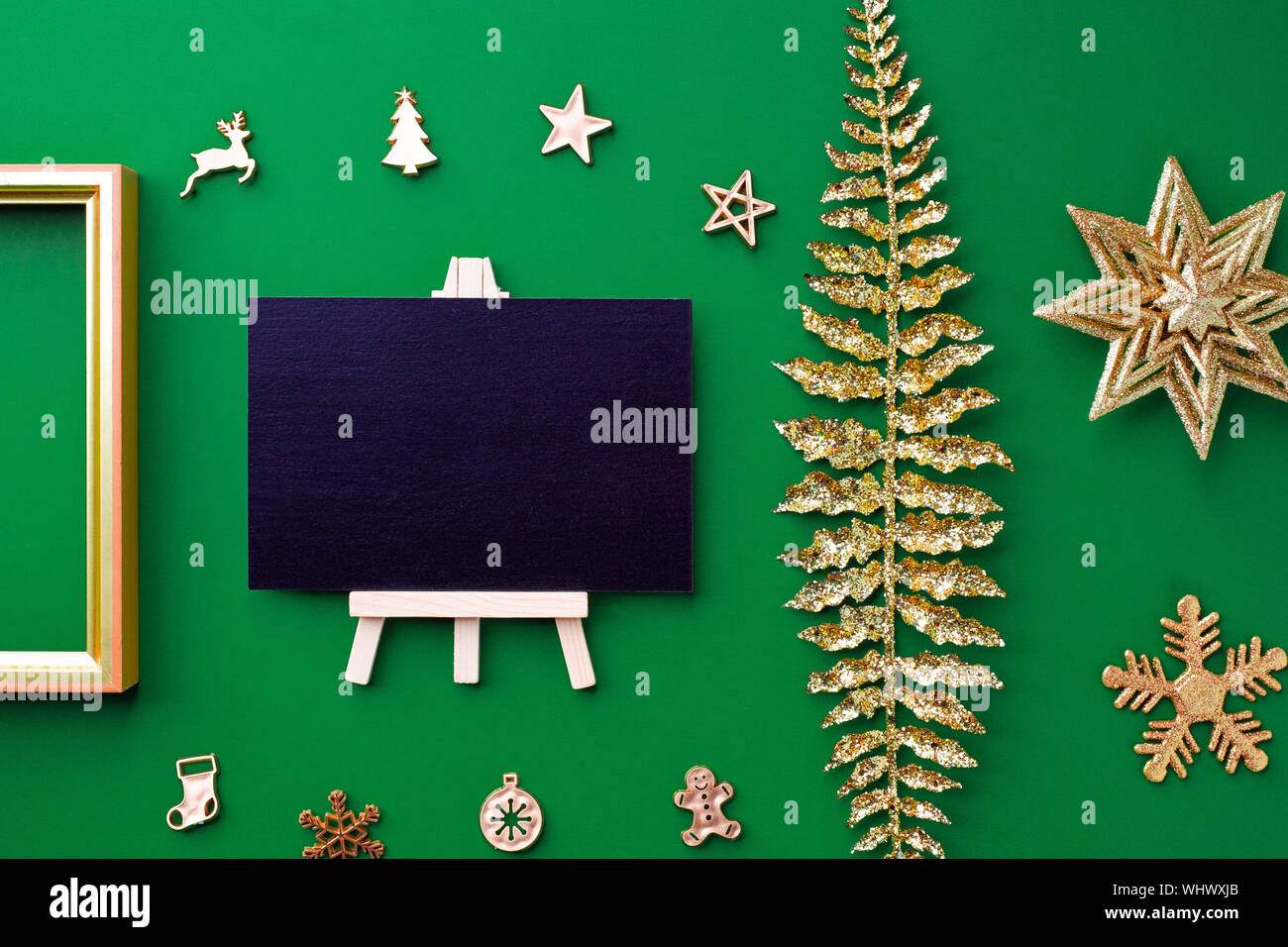 Blackboard Top View With Gold Christmas And New Year Decoration
