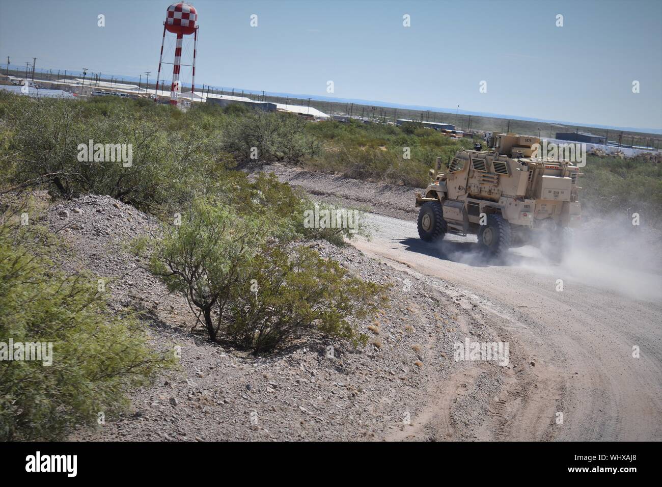 U.S. Soldiers in Bravo Company, 1-252 Armor Regiment, 30th Armored Brigade Combat Team, North Carolina National Guard, drive the MaxxPro Mine Resistance Ambush Protected (MRAP) and Joint Light Tactical Vehicle (JLTV) while conducting mobilization training in the vicinity of Fort Bliss, Texas, August 31, 2019.  The 30th ABCT is preparing to mobilize to support Operation Spartan Shield and is comprised of Soldiers from the North Carolina, South Carolina, West Virgina and Ohio National Guard. (U.S. Army National Guard photo by Lt. Col. Cindi King) Stock Photo