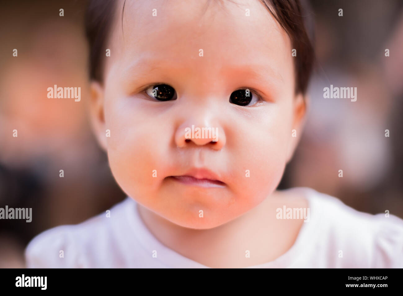 Close up shot of asian baby's face Stock Photo