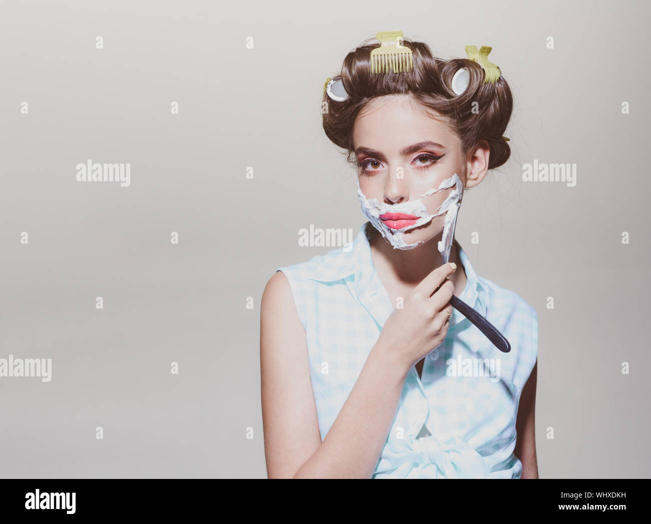 retro woman shaving with foam and razor blade. pinup girl with fashion ...