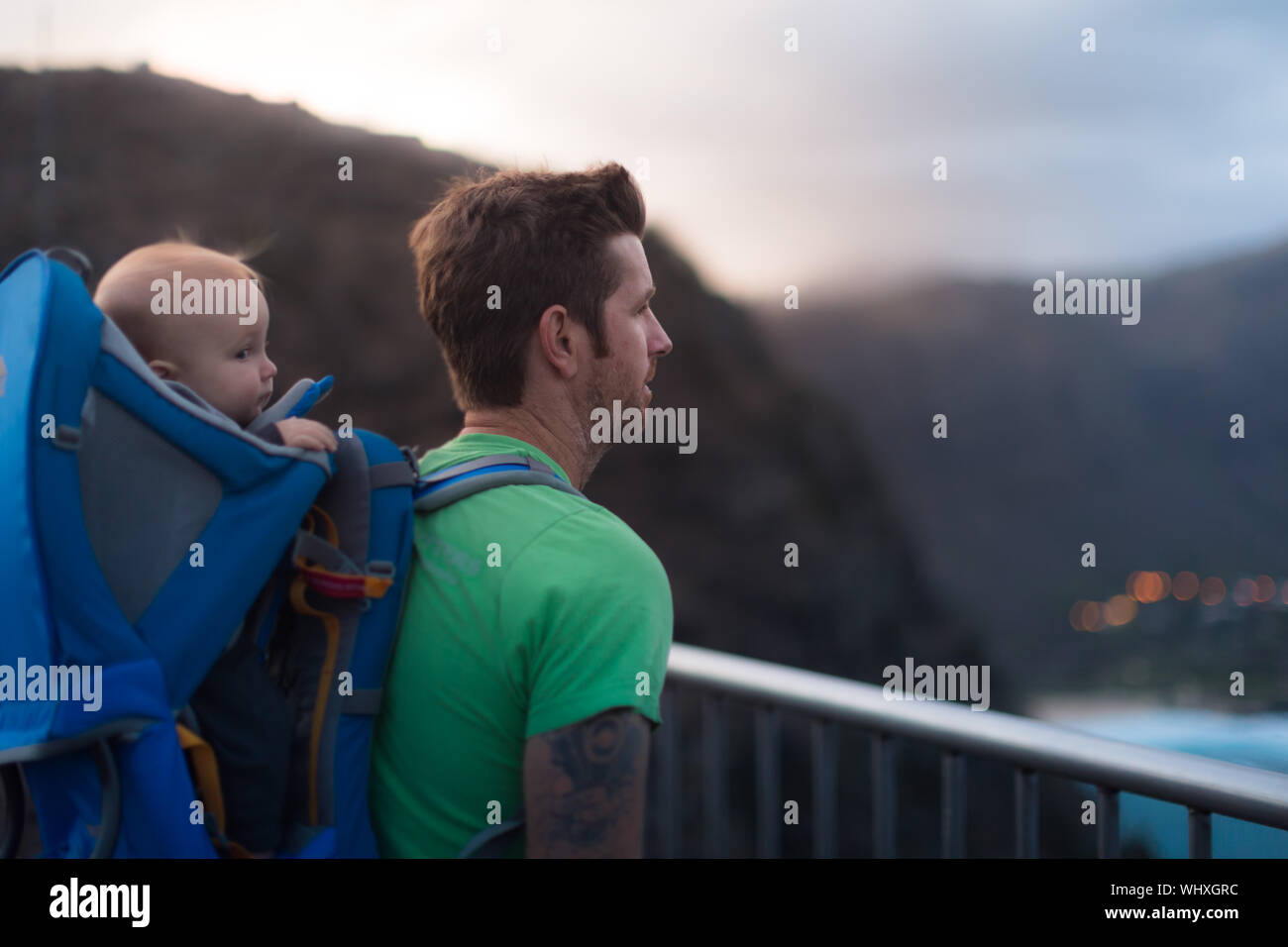 Looking out at a high view after a long hike. Family being active together Stock Photo