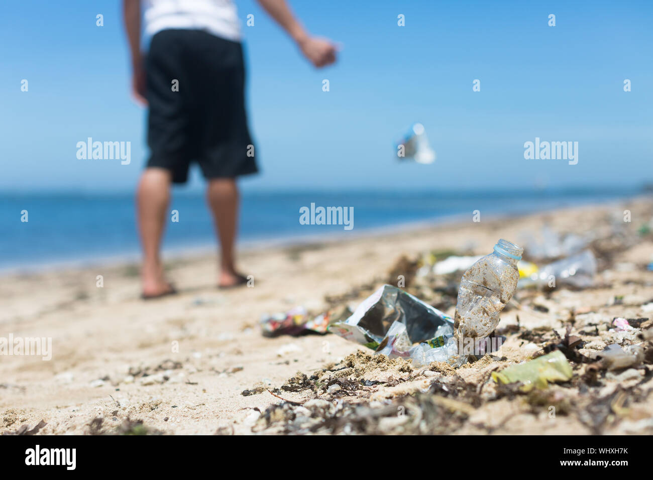 The beach getting destroyed by people littering constantly and ruining the environment Stock Photo
