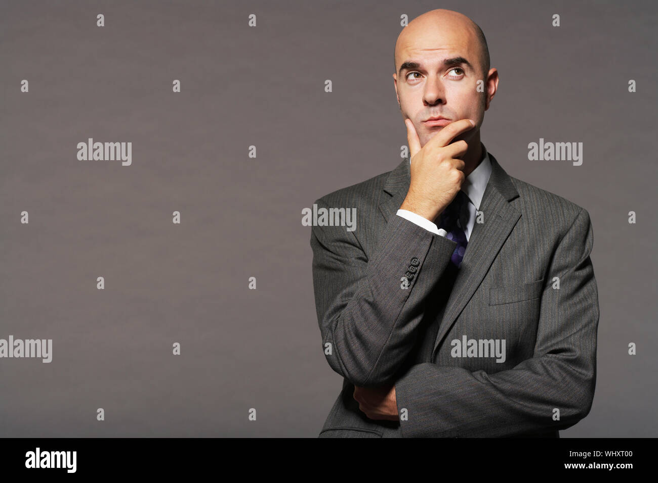 Man bald chin pensive hi-res stock photography and images - Alamy
