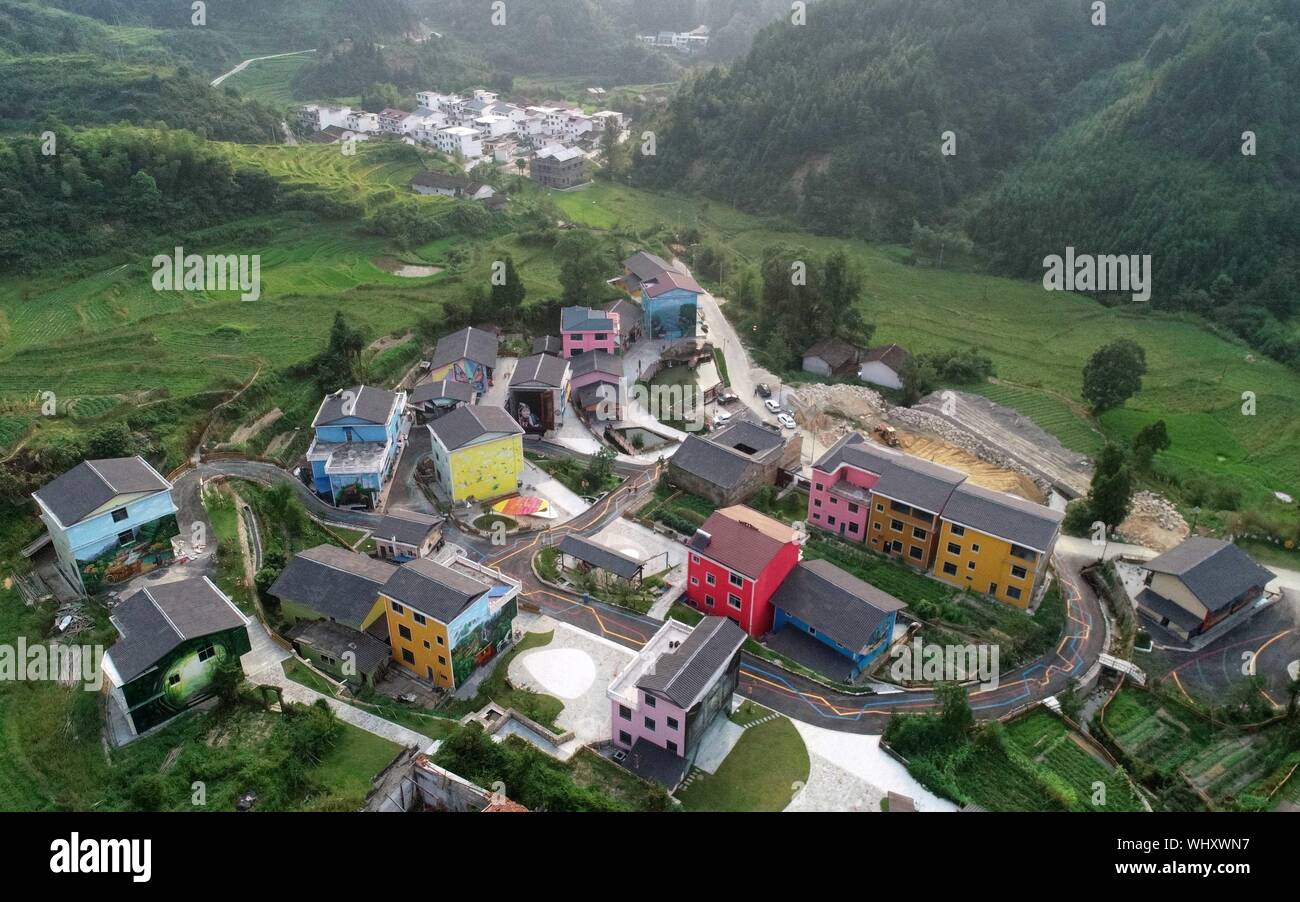 Beijing, China. 21st Aug, 2019. Aerial photo taken on Aug. 21, 2019 shows the view of Datong Village in Jinzhu She Ethnic Group Township in Le'an County, east China's Jiangxi Province. China has adopted the vision that lucid waters and lush mountains are invaluable assets and pursued a holistic approach to conserving its mountains, rivers, forests, farmlands, lakes, and grasslands. At the very highest levels, China is driving the way forward in the construction of an ecological civilization. Credit: Peng Zhaozhi/Xinhua/Alamy Live News Stock Photo