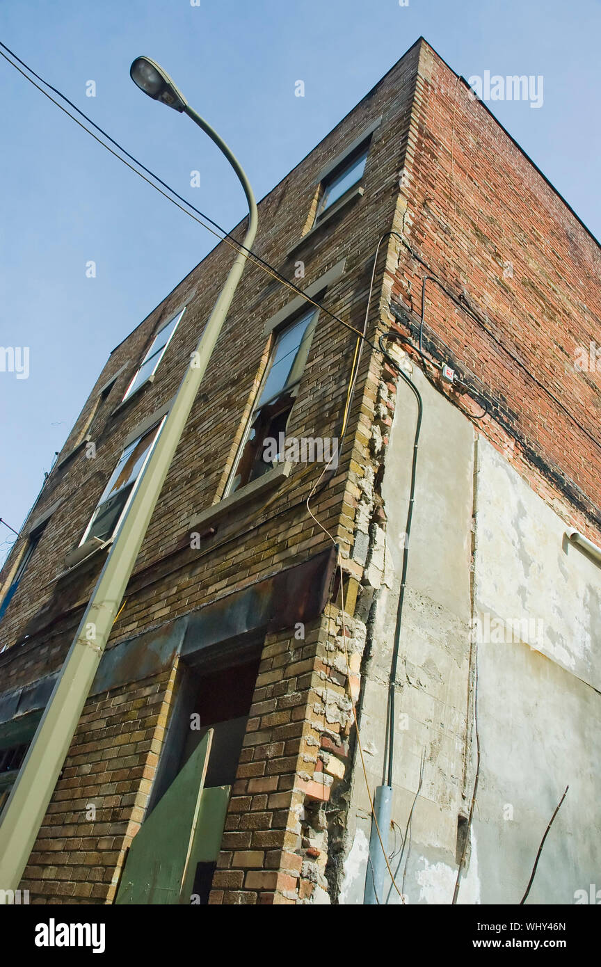 an old abandonned building with broken windows Stock Photo - Alamy